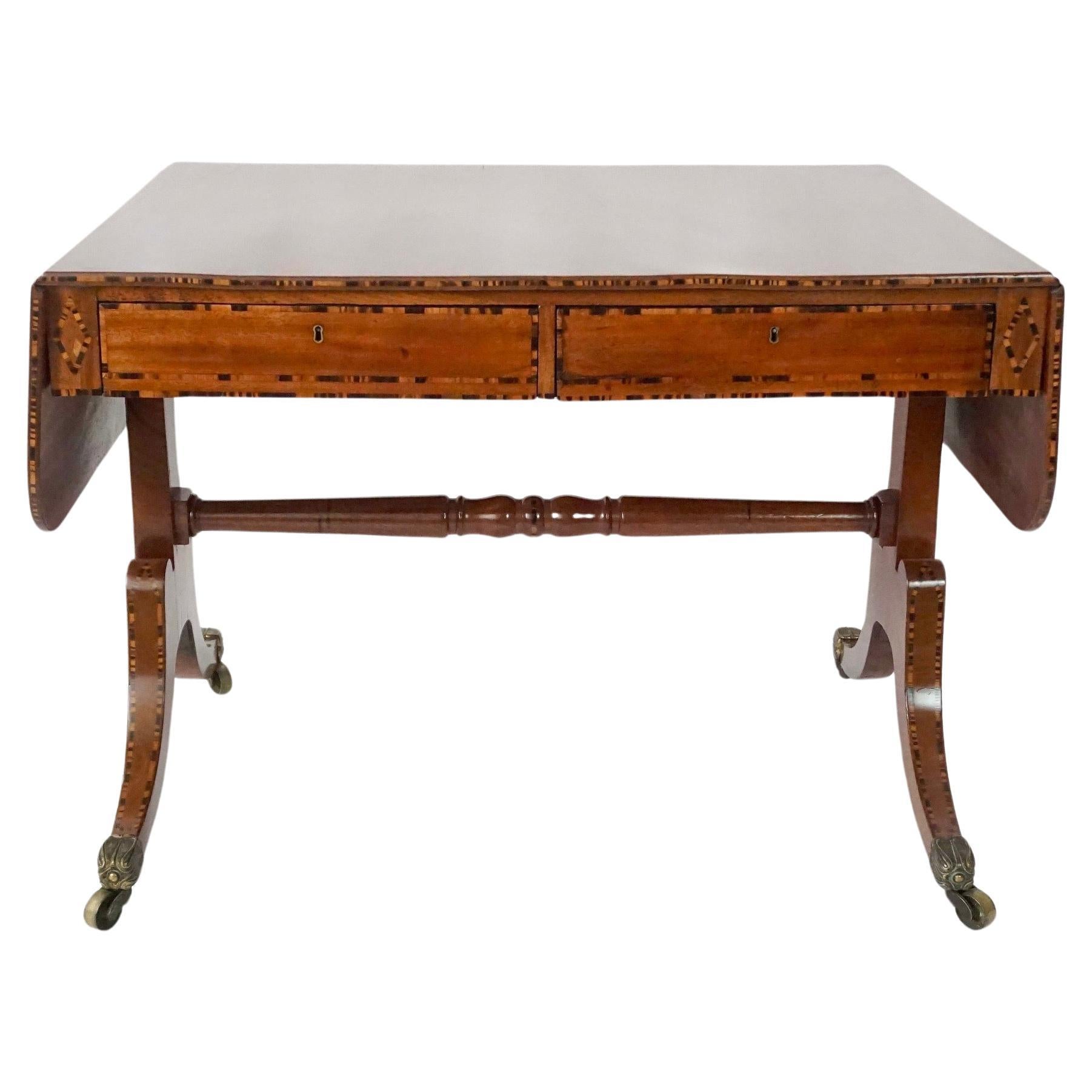 Mesa de sofá de caoba con incrustaciones de calamandro de William Wilkinson, Londres, hacia 1820 en venta