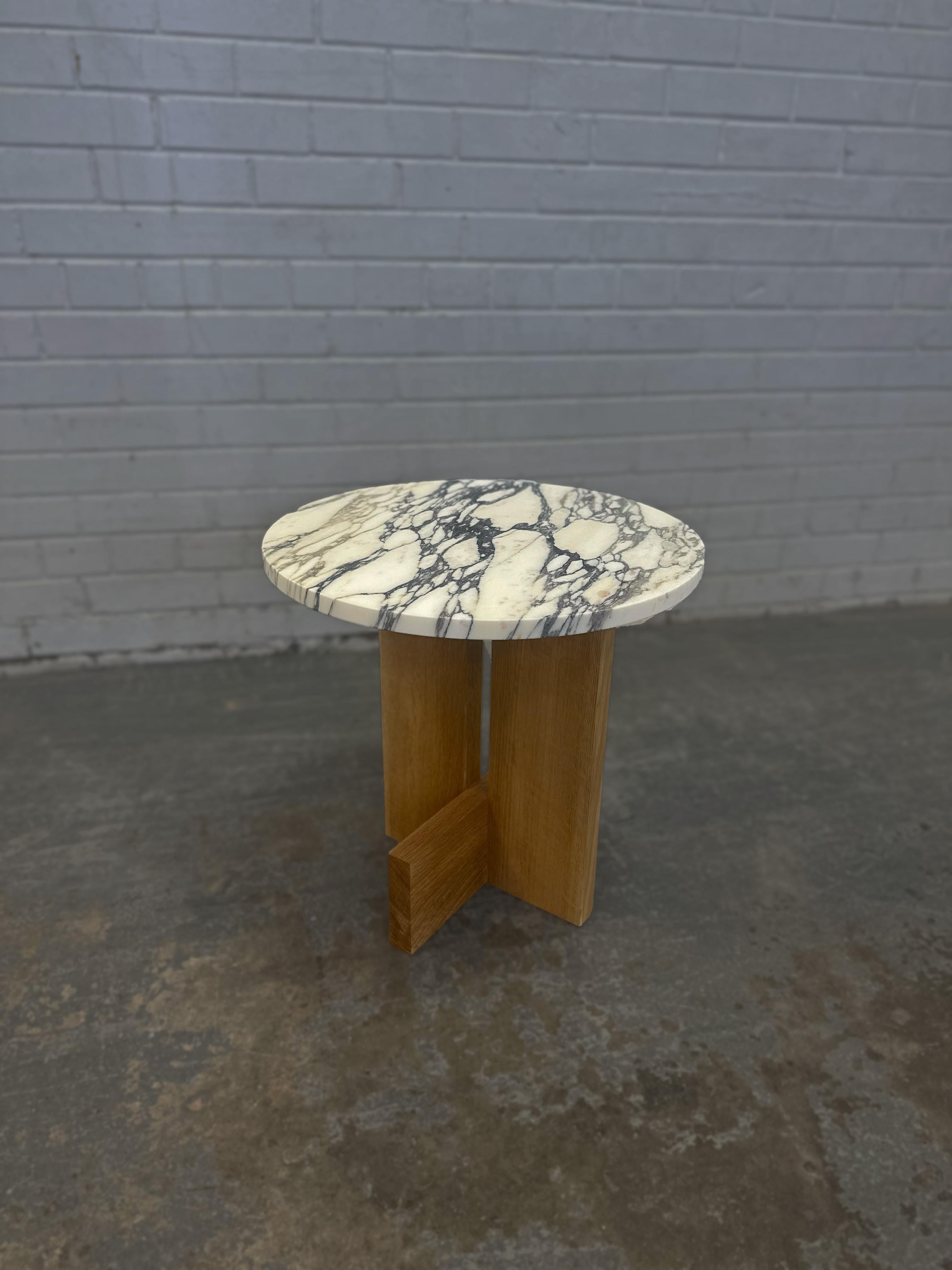 Designed to be the perfect, round accent to (almost) any room, our Axel side table is available as a solid wood or marble-topped piece. Coming in a variety of wood and stone finishes this piece is one of our quick ship offerings. Standardized