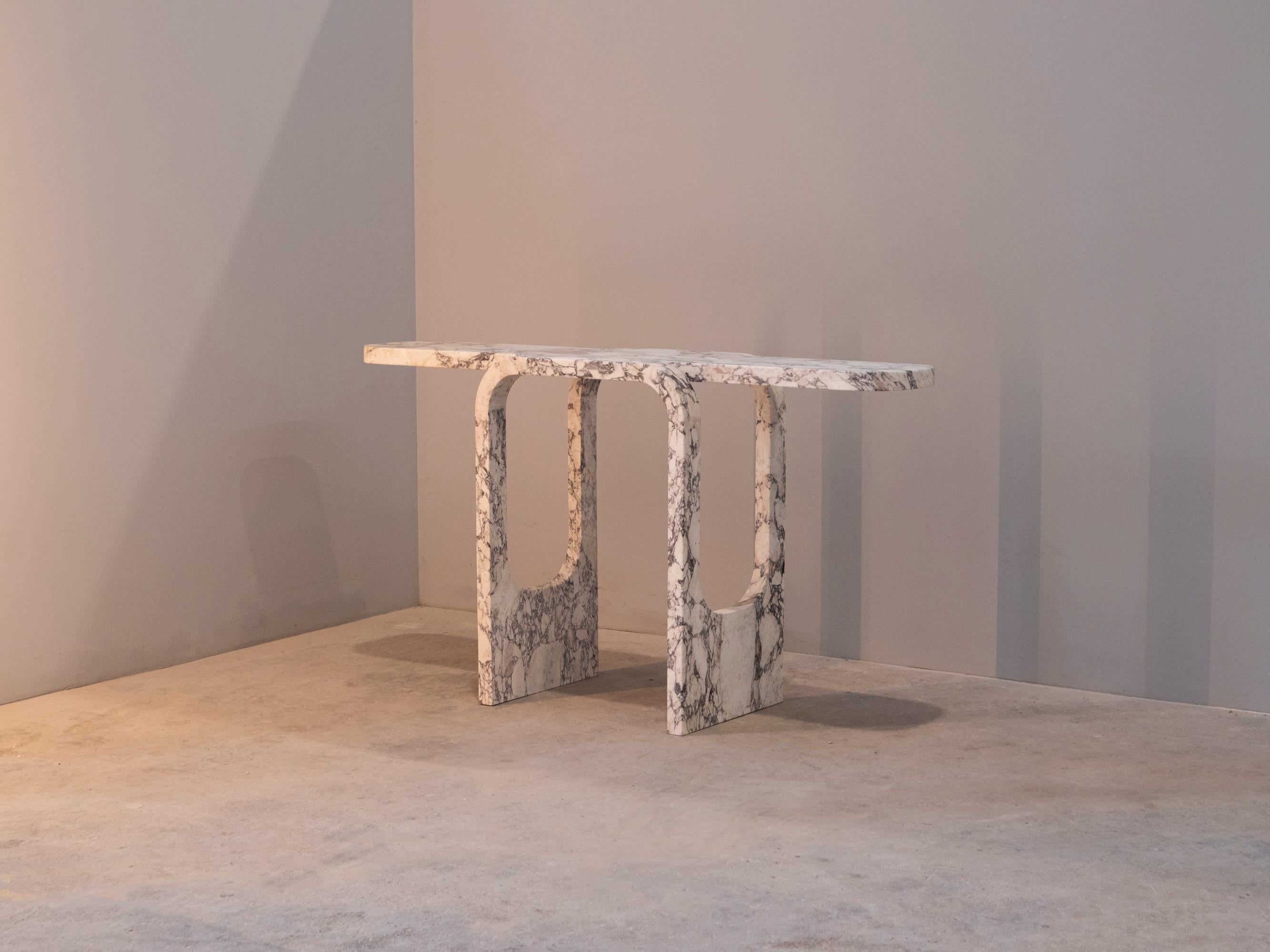 Calcatta viola cut and fold console table by dAM Atelier
Dimensions: W 150 x D 42 x H 80 cm
Materials: Calacatta viola marble.


dAM atelier is a duo of young Italian architects sharing the passion for design and architecture, Paolo