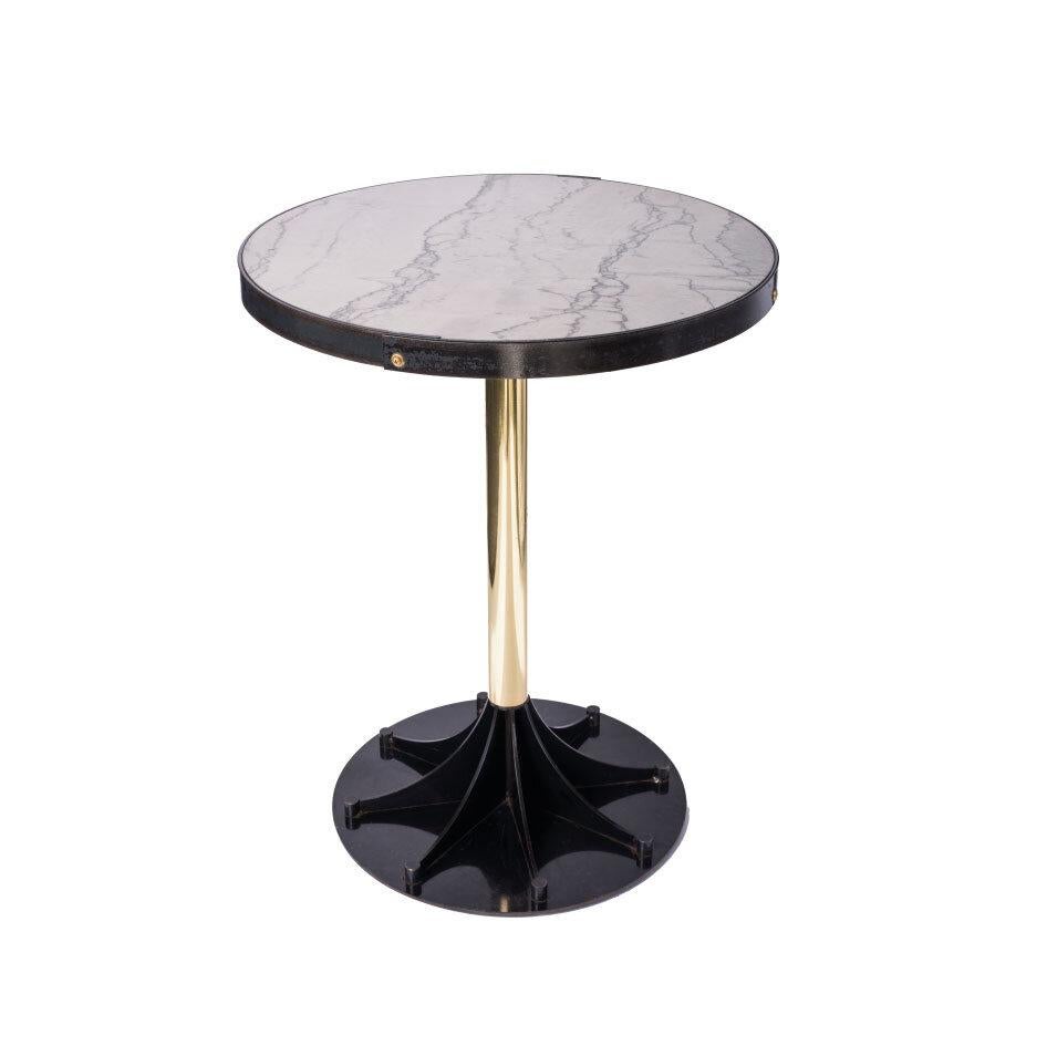 Designed by Basile Built, renowned Design-Fabrication Studio based in San Diego, California. The Studio's commitment to detail is on full display in the design of this table. A brass and steel flowering base serves as the foundation for the satin