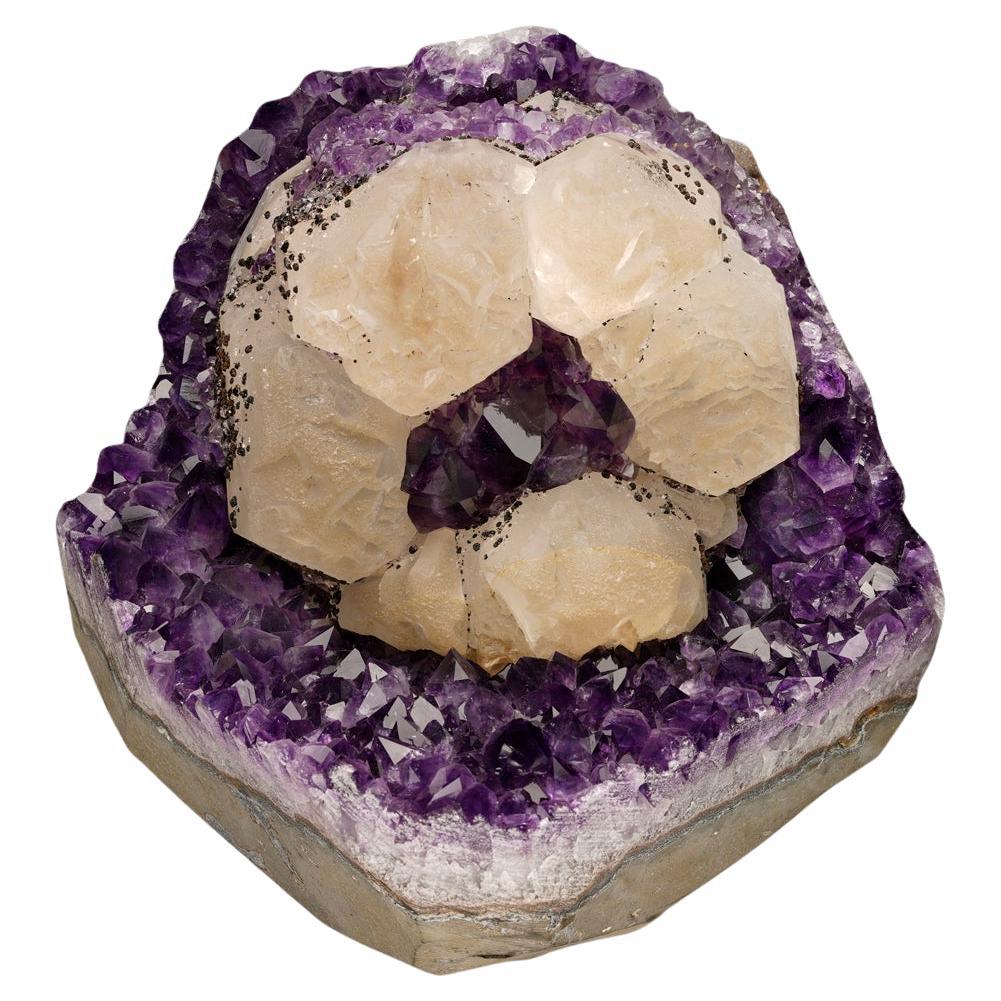 Calcite on Amethyst with Goethite