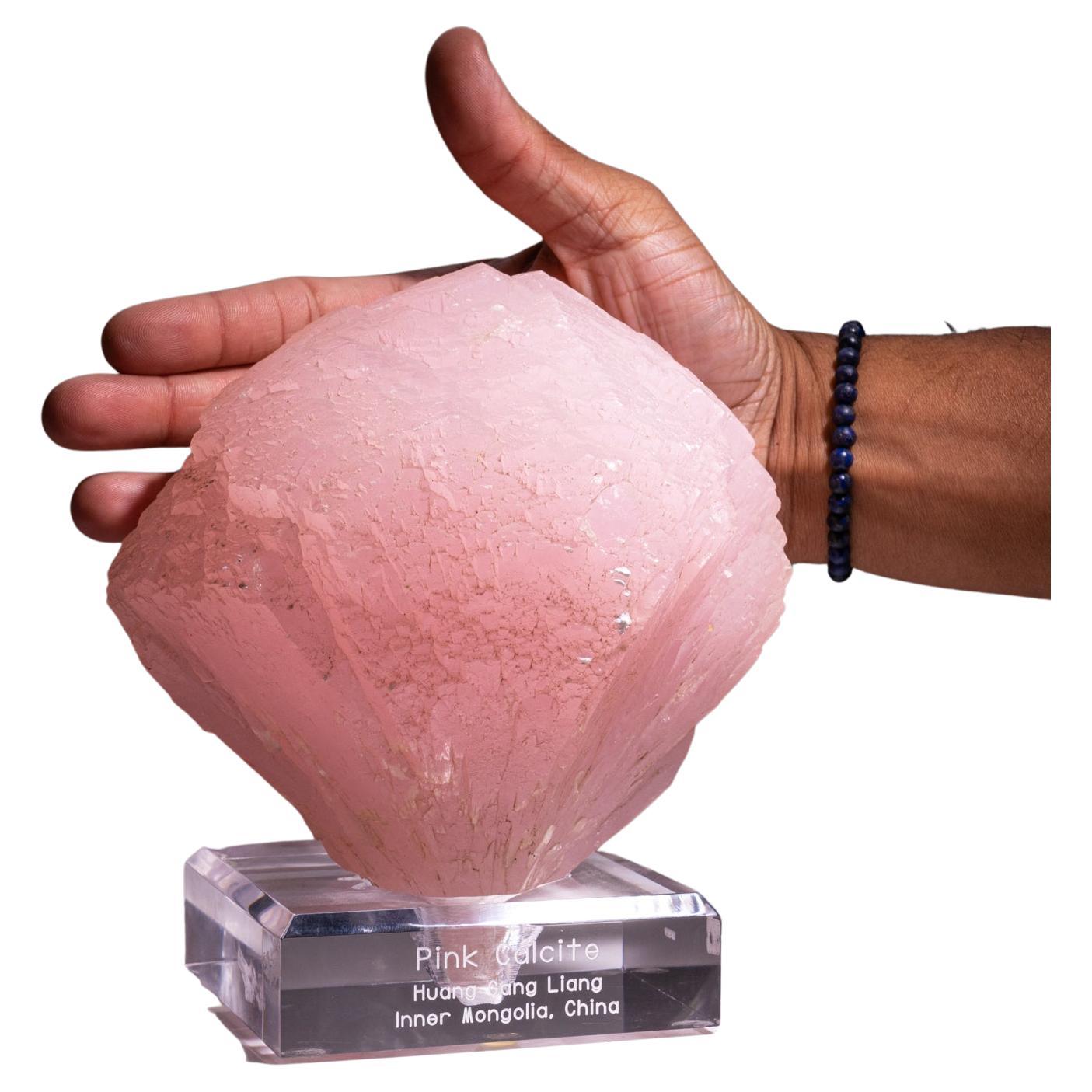 De la mine Huanggang, Kèshíkèténg Qí, Chifeng, Mongolie intérieure, Chine.

Fleur de calcite rose mangano. La couleur rose de la calcite est due à des impuretés de manganèse et elle est souvent étiquetée comme manganocalcite, un nom de minéral