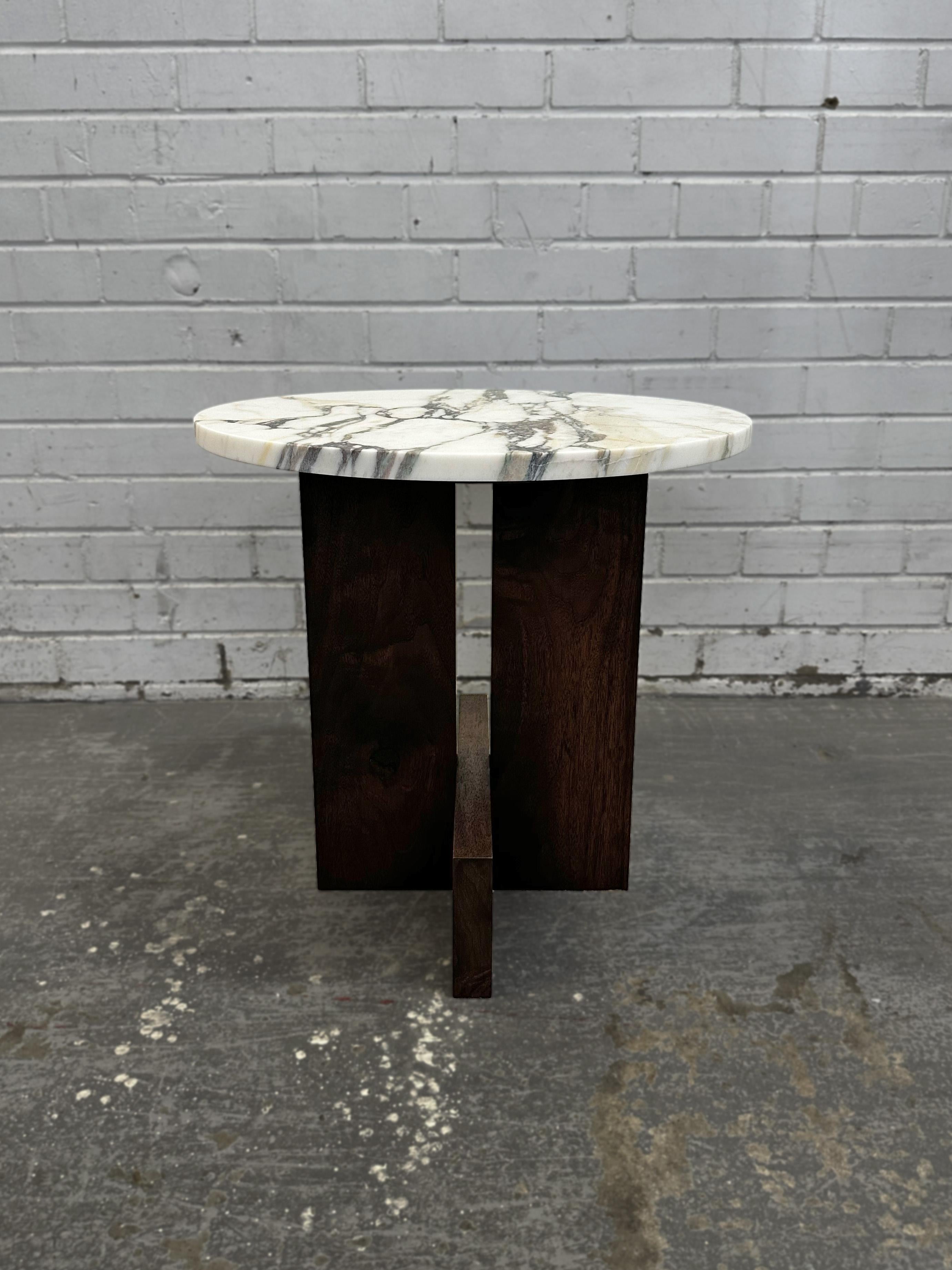 Designed to be the perfect, round accent to (almost) any room, our Axel side table is available as a solid wood or marble-topped piece. Coming in a variety of wood and stone finishes this piece is one of our quick ship offerings. Standardized