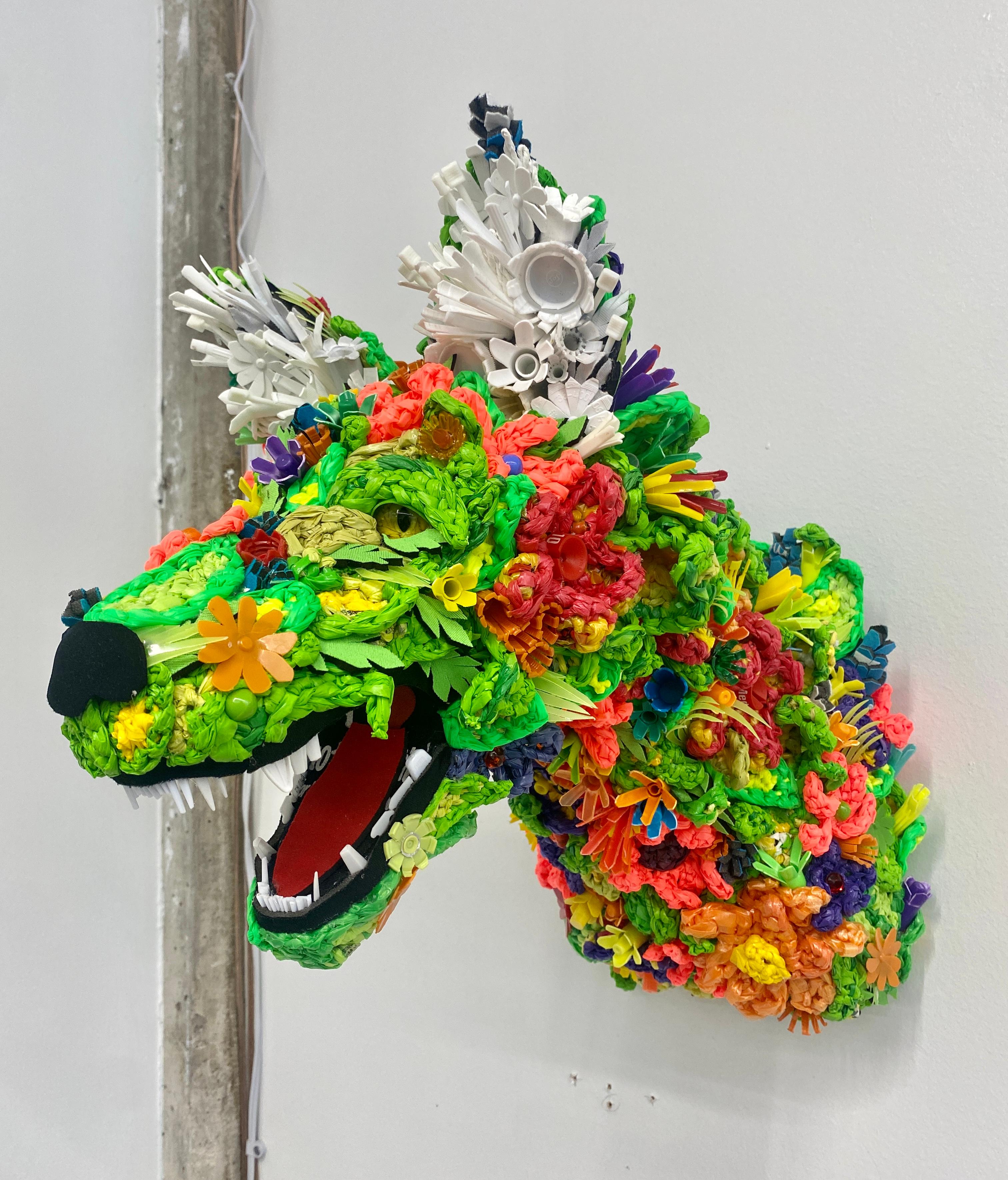 Calder Kamin Figurative Sculpture - Wildflower Wolf, Contemporary sculpture, Assemblage, Found Objects, Plastic