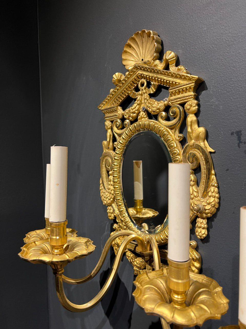 Neoclassical Pair of Caldwell Neoclassic Sconces with Mirrored Backplate