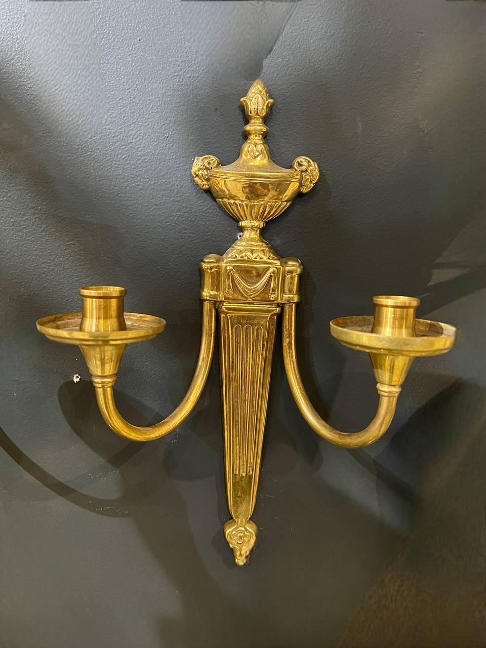 A circa 1920's Caldwell gilt bronze sconces with Rams Heads and two lights