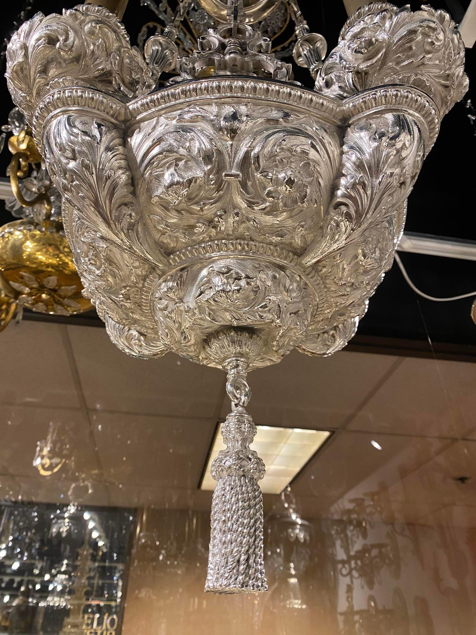 A Caldwell chandelier with 4 lights and a very unusual design, circa 1900. In very good vintage condition.

Dealer: G302YP