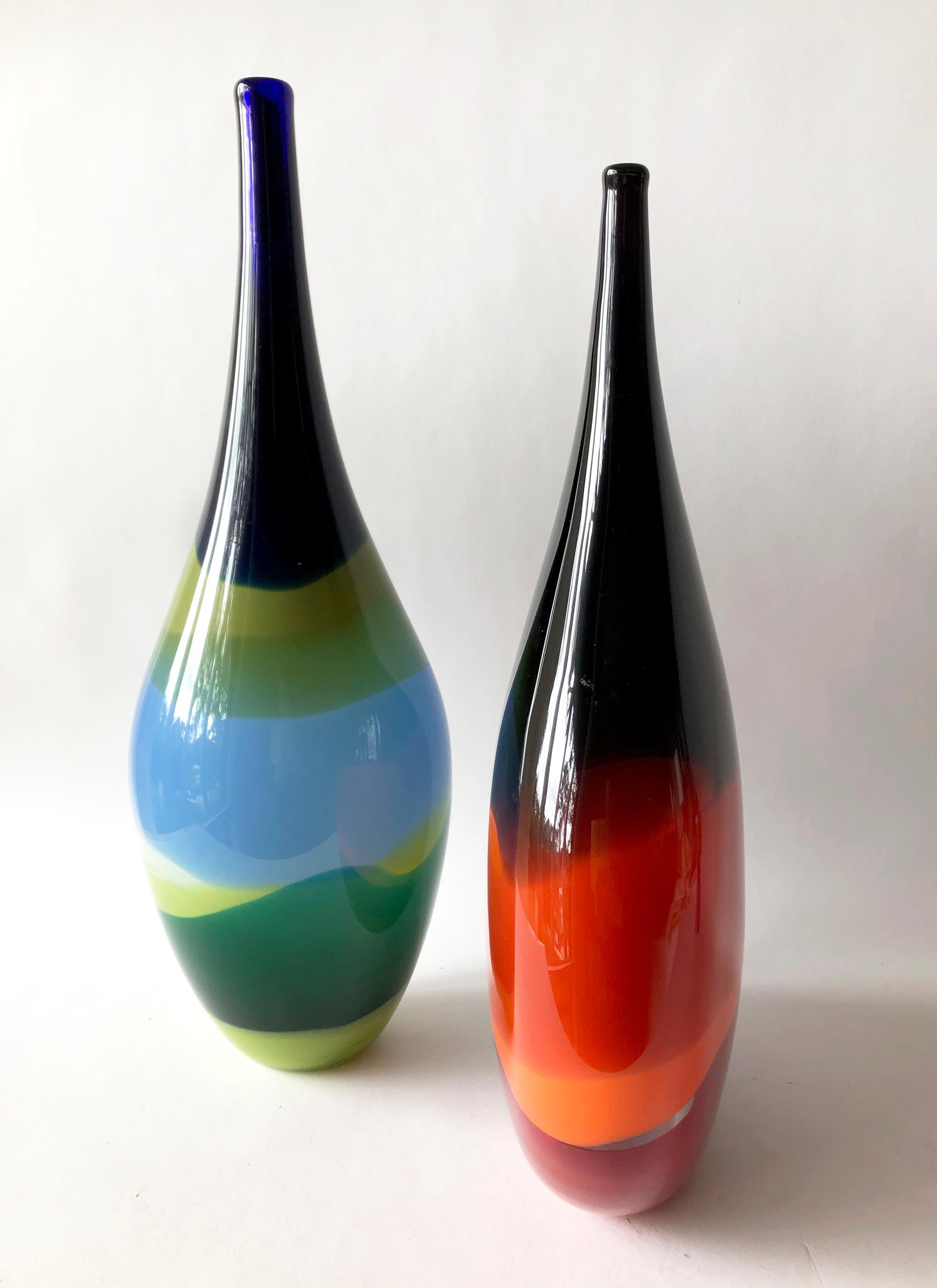 Pair of glass vases made by Caleb Siemon of Siemon & Salazar, California. Tall bottle form measures 18.5