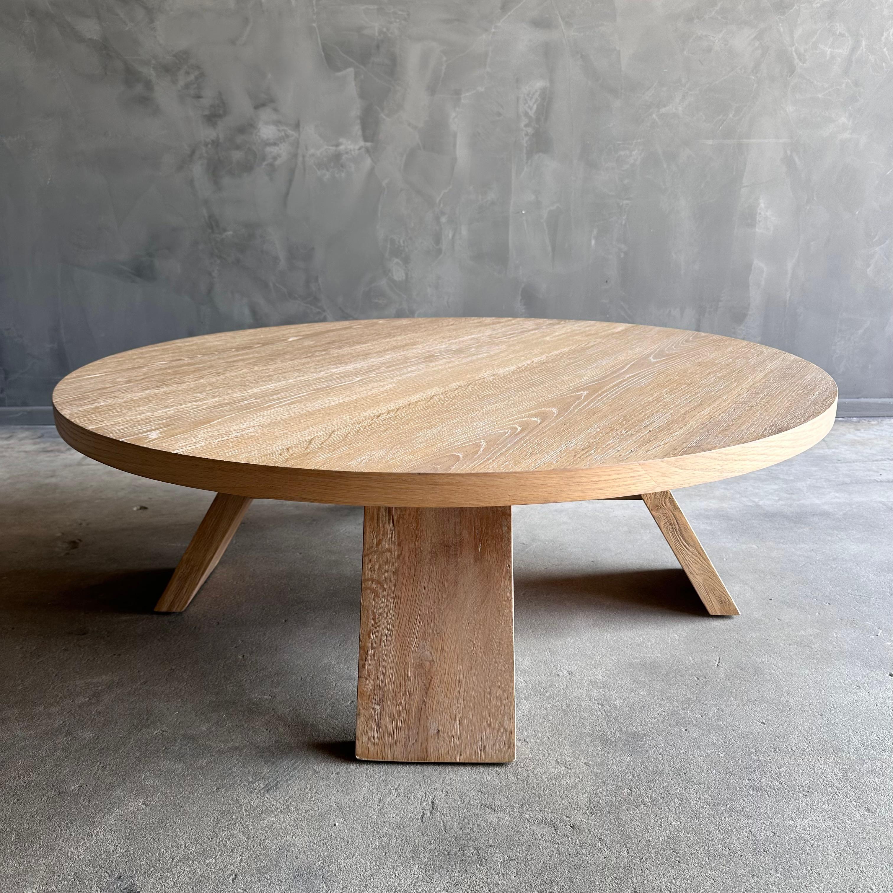 Introducing the Caleb Oak Coffee Table, crafted with premium white oak veneer top and solid white oak legs. This stunning piece features a natural finish that enhances the beauty of the white oak wood. The current design style of the table is a
