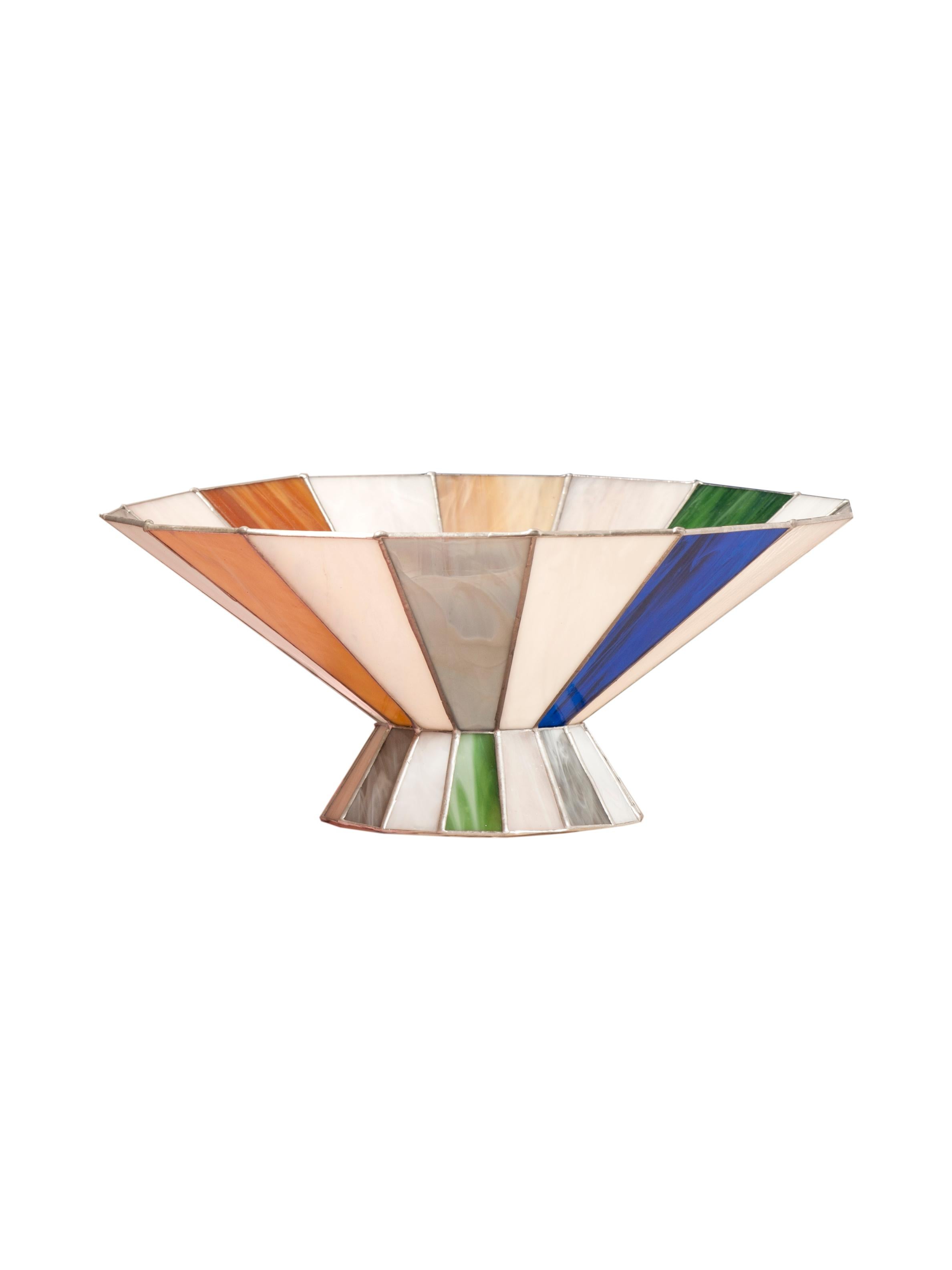 Caleido bowl by Serena Confalonieri
Dimensions: D 36 cm x H 15 cm
Materials: Handmade stained glass
Glass colors: White, blue, pale pink, forest green, grey, brown

Handmade stained glass bowl.

Serena Confalonieri (1980) is an independent