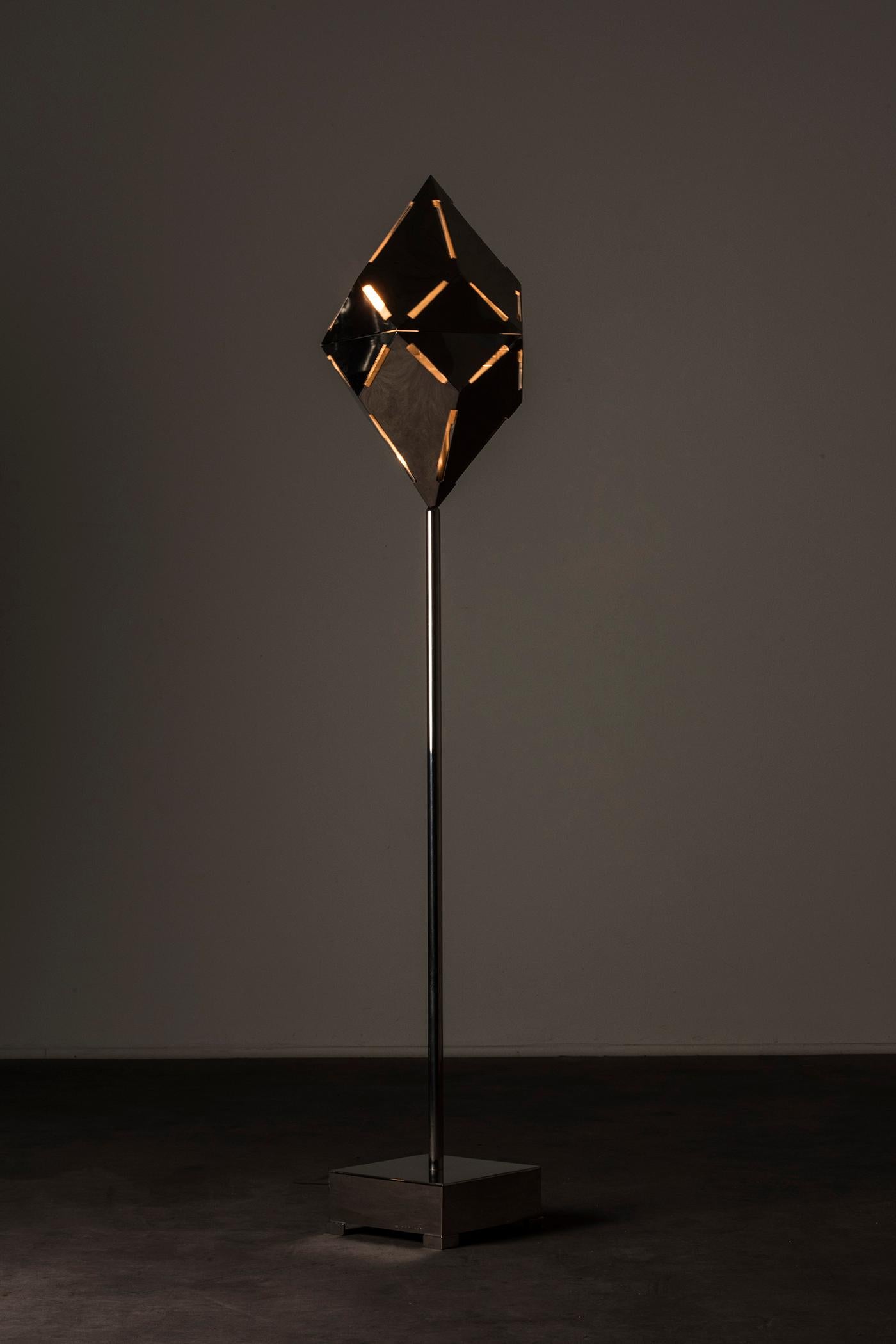 Caleidoscopio floor lamp by Gabriella Crespi. Italy, circa 1970 Signed and numbered exemplar. Example provided with certificate of authenticity released by Archivio Gabriella Crespi. Nickel-plated brass. Measures: 18.5 x 18.5 x H 128 cm (7.2 x 7.2 x