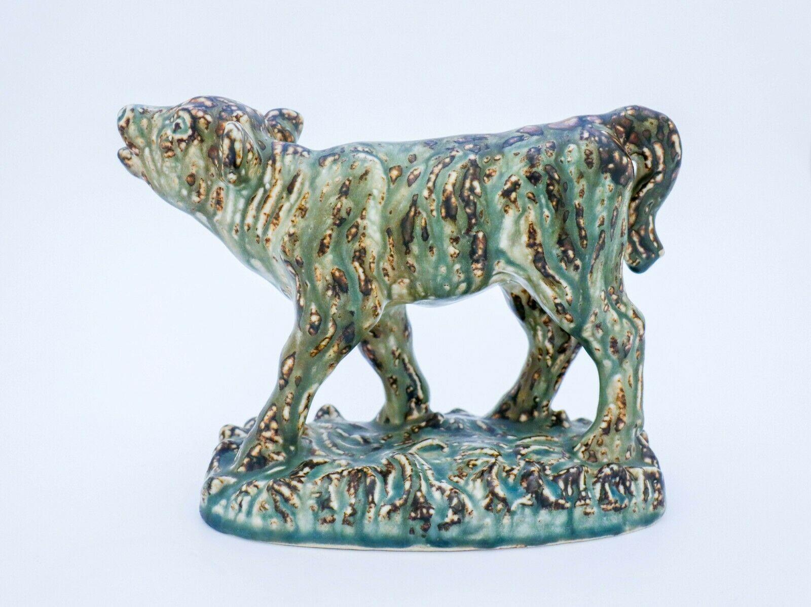 A beautiful sculpture in shape of a calf designed by Knud Kyhn at Royal Copenhagen, the sculpture have model-number 21736 It is 18,5 cm high and 25 x 11 cm. It´s in mint condition and marked as 1:st quality.