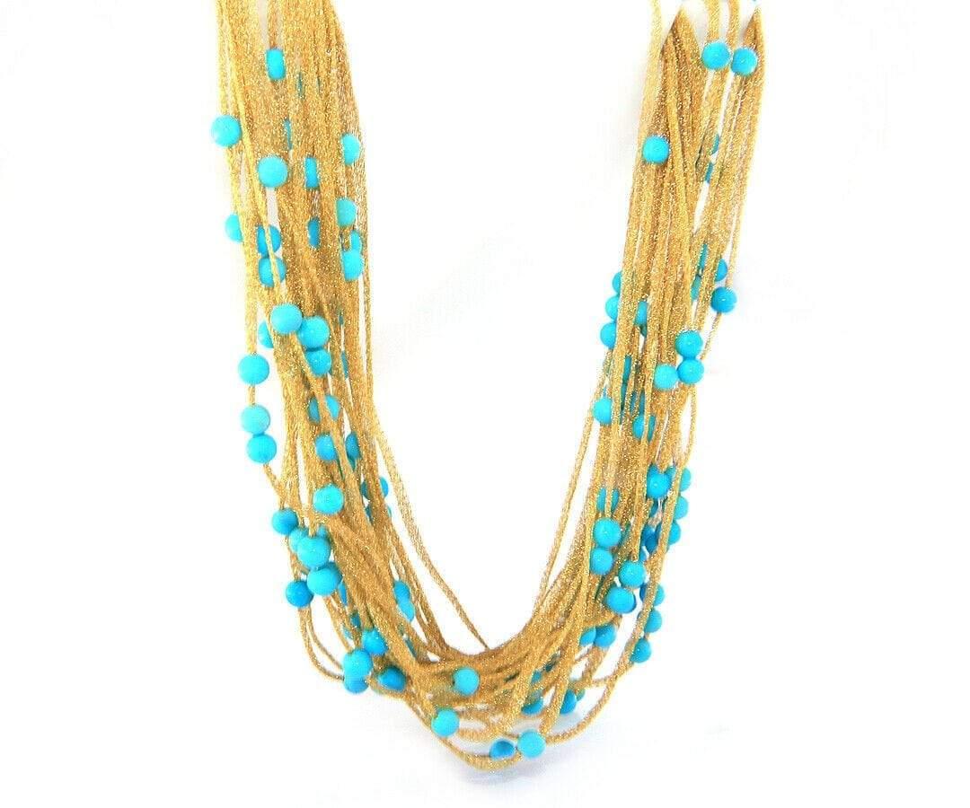 Calgaro Mesh Multistrand Turquoise Beads Necklace in 18K

Calgaro Mesh Multistrand Turquoise Beads Necklace
18K Yellow Gold
Necklace Width: Approx. 12.0 – 30.0 MM
Necklace Length: Approx. 15.50 Inches
Weight: Approx. 29.0 Grams
Stamped: 750,