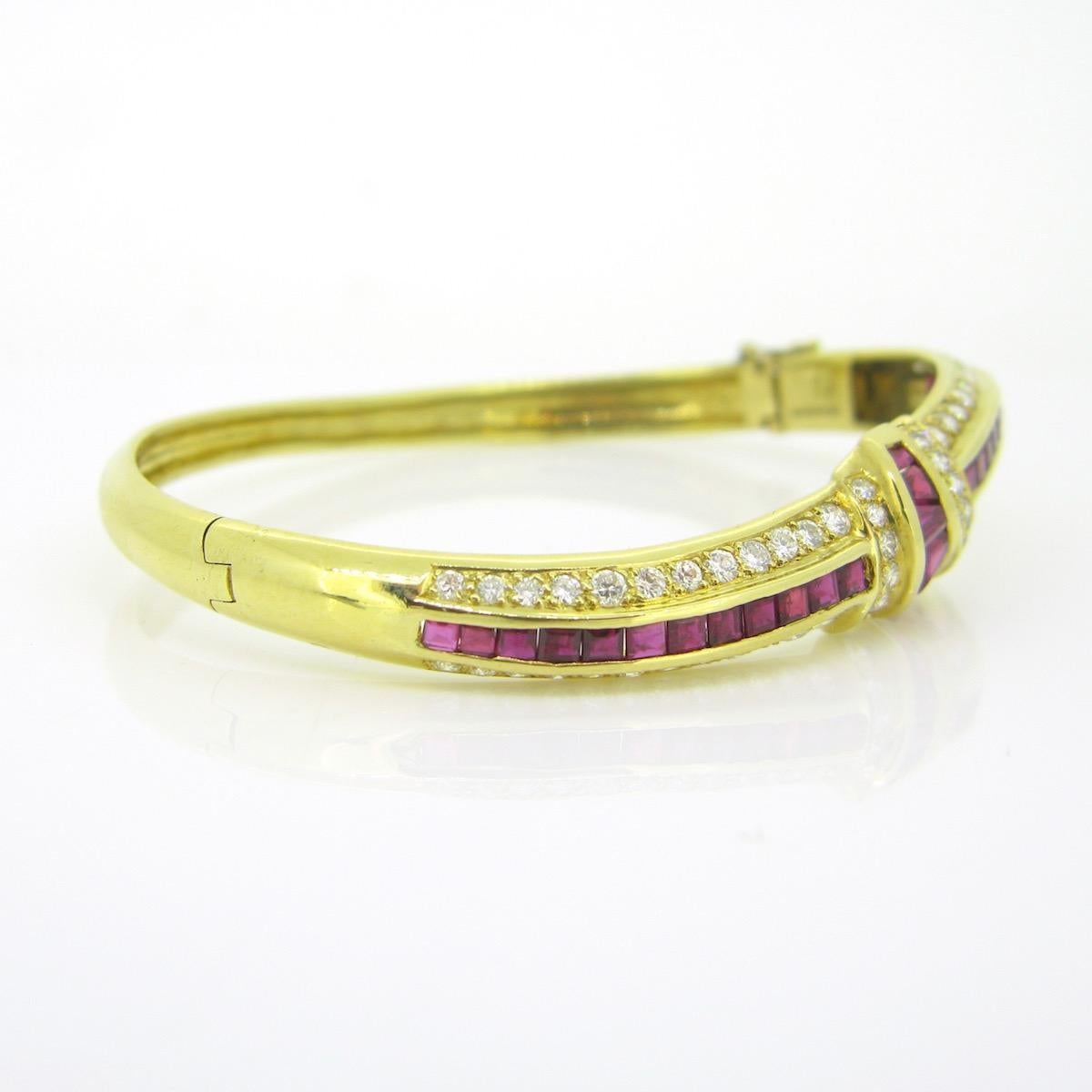 Brilliant Cut Calibrated Rubies and Diamonds Bangle Bracelet, 18kt Yellow Gold