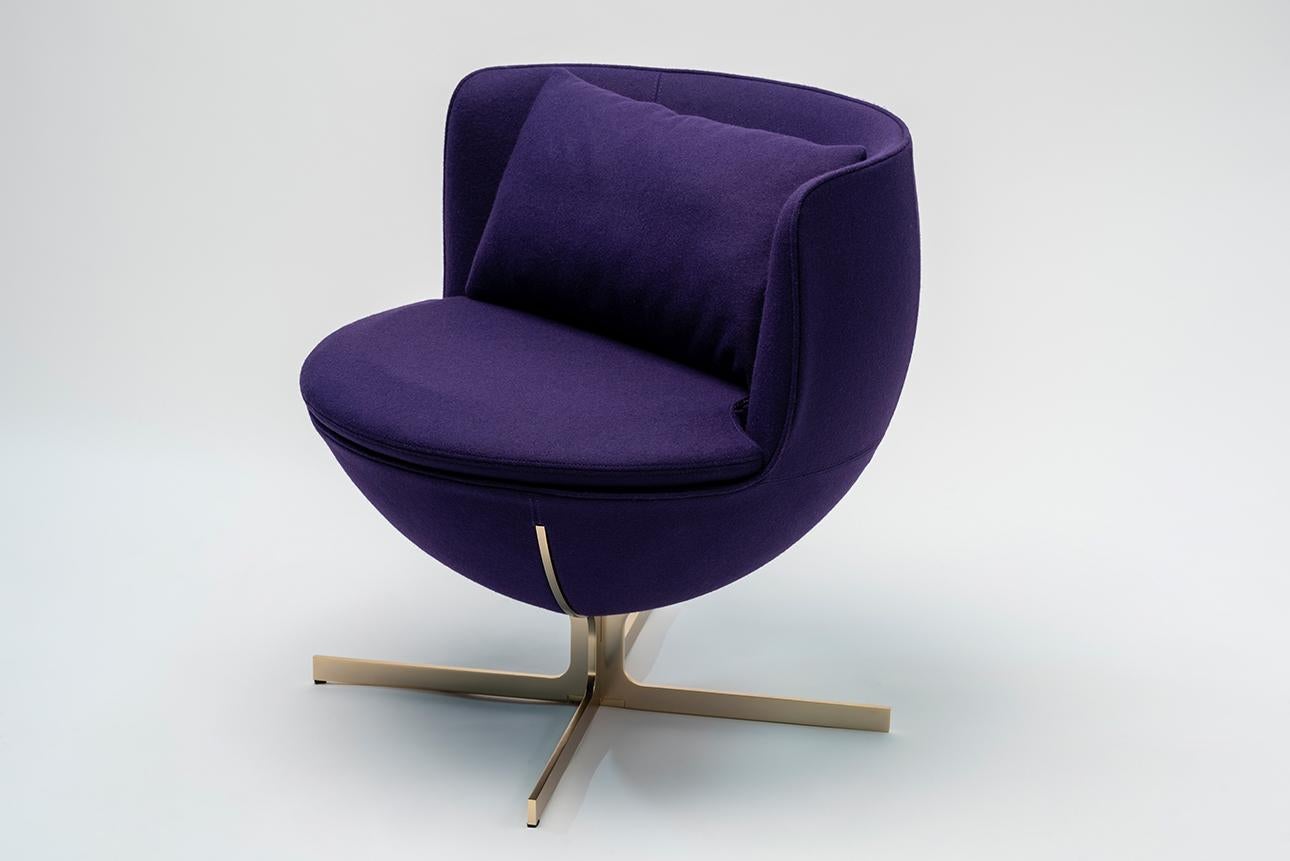 Calice armchair four-star base by Patrick Norguet
Materials: Upholstery: Fabric also available in leather
 Structure: Black powder-coated metal or Matte champagne and Black chrome 
Dimensions: W 72.8 x D 70.7 x H 71.6 cm
 HS 43.7 cm

The