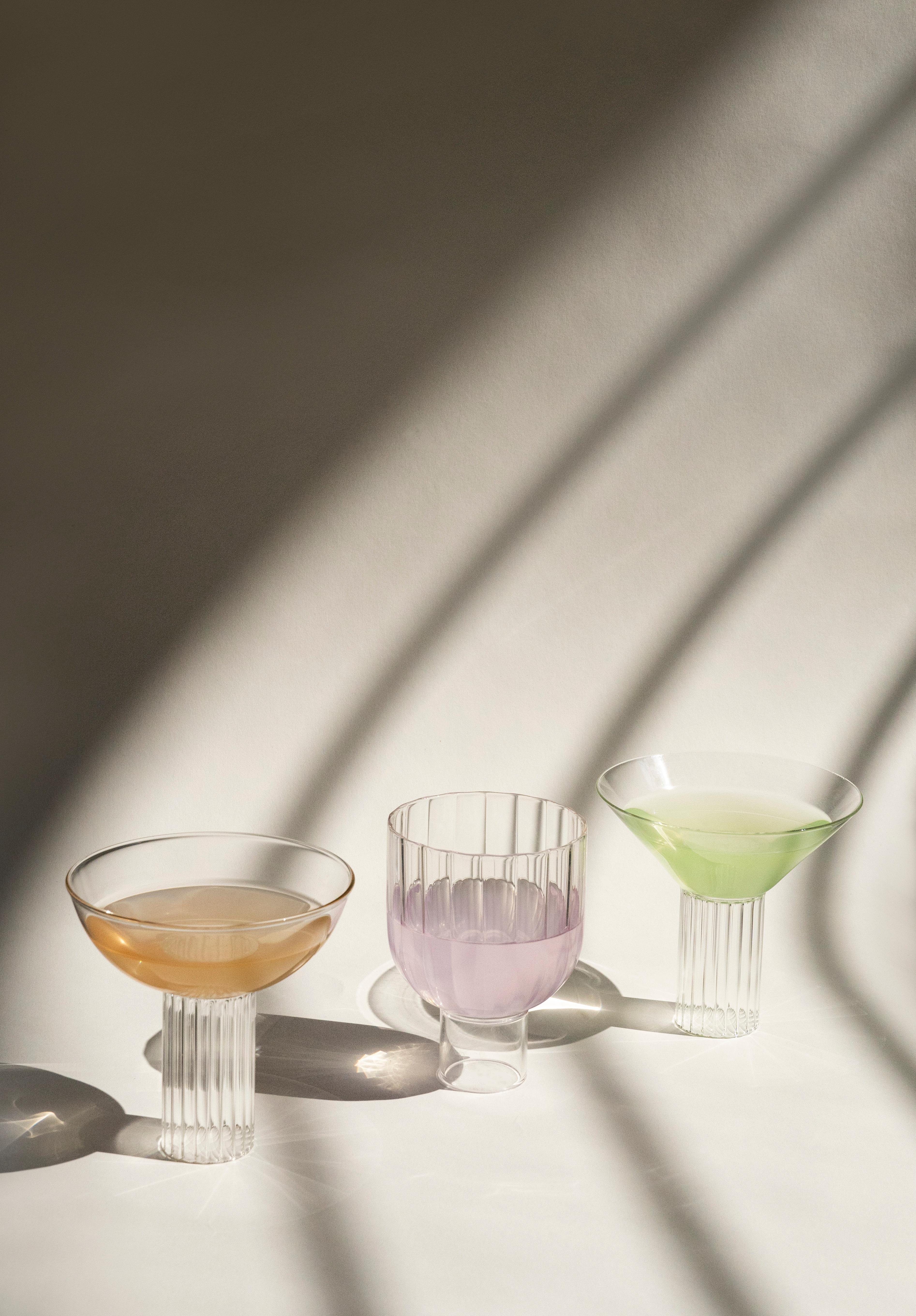 The striking geometric shapes of CALICI MILANESI recall the Modern architectural gems of Milan. Each piece is handmade in Italy by master glassblowers using high-quality borosilicate glass. 

Dishwasher safe and resistant to thermal shock, allowing