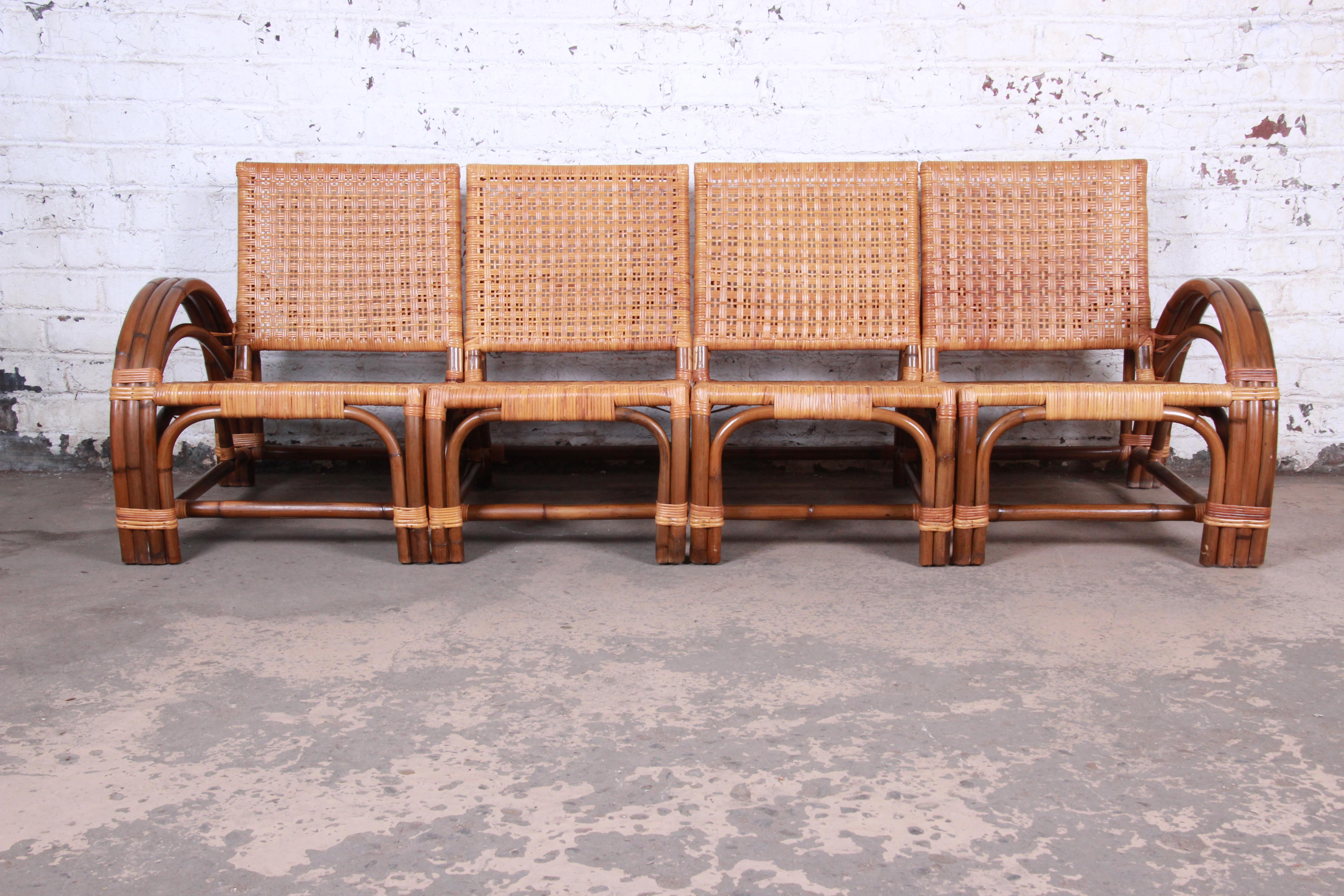 A rare and exceptional Mid-Century Modern Hollywood Regency rattan four-piece sectional sofa

Made by Calif-Asia

Philippines, circa 1950s

Crafted rattan and hardwood

Measures: 88
