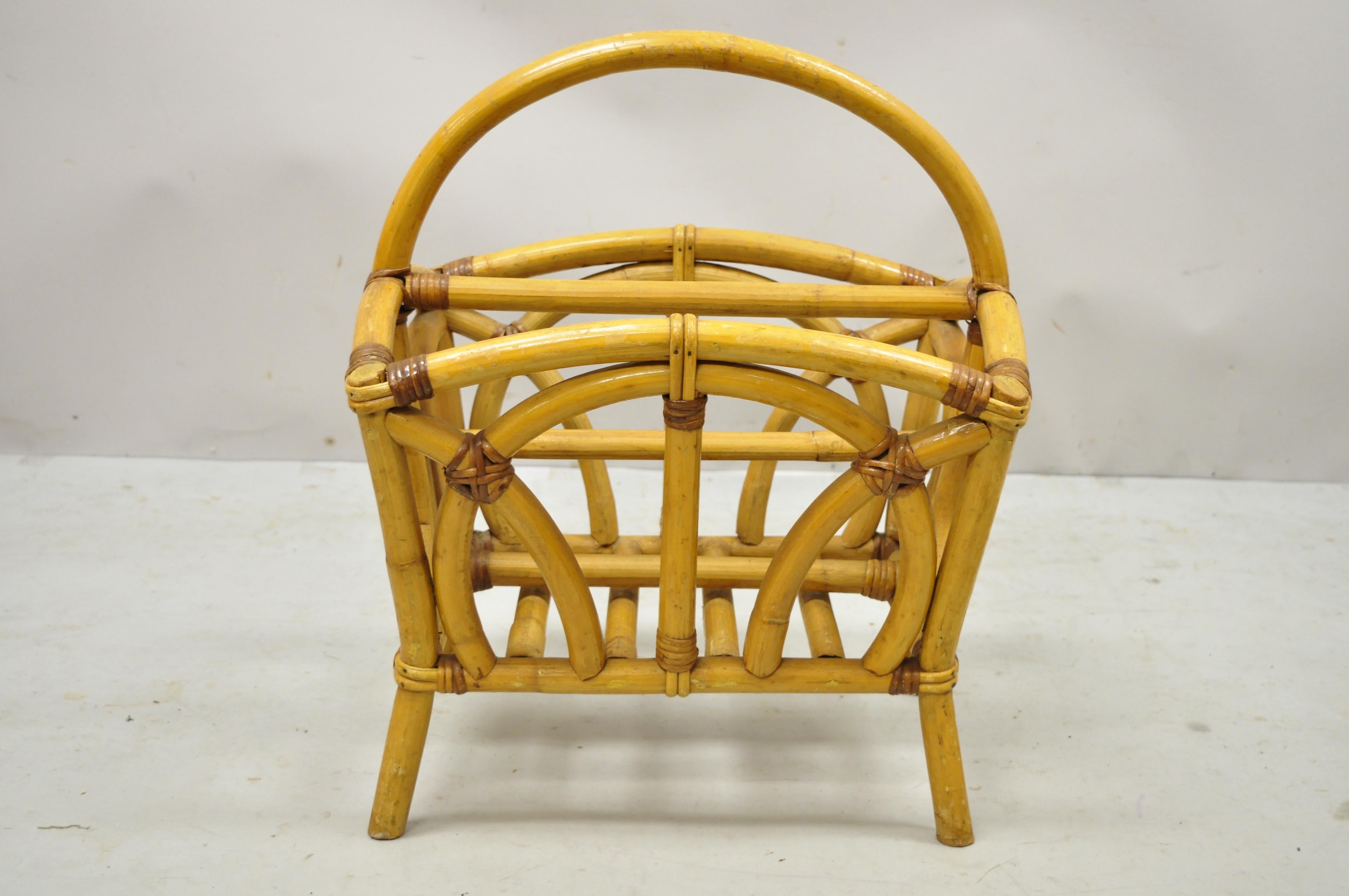 Vintage Calif-Asia Rattan bamboo Chinese Chippendale boho Tiki magazine rack stand (A). Item features original label, very nice vintage item, sleek sculptural form. Circa mid 20th century. Measurements: 20.5