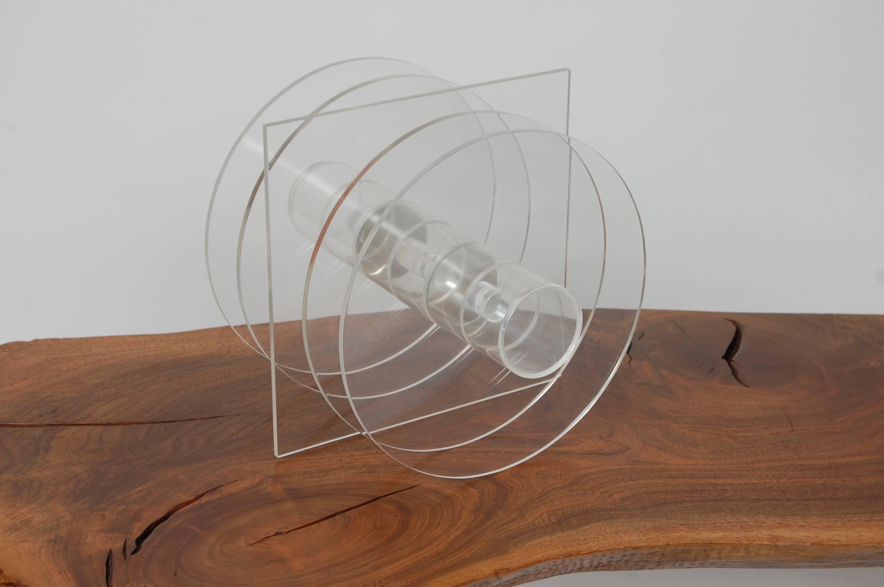 Acrylic abstract sculpture consisting of bisected circles and a square created during the 1970s by San Diego artist Bob Matheny (b 1929). Matheny moved to San Diego during the 1950s, was part of the Aillied Craftsman, he taught and helped create the