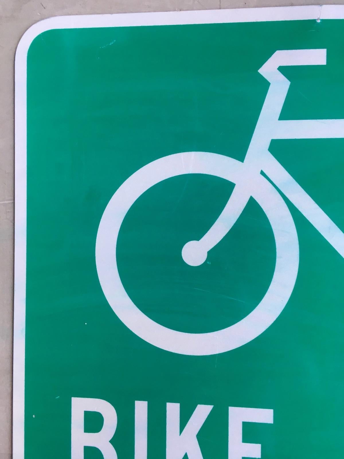 Vintage bike route sign from streets of California. Good condition with one dent in metal in bottom middle of sign. Fun piece of California history.