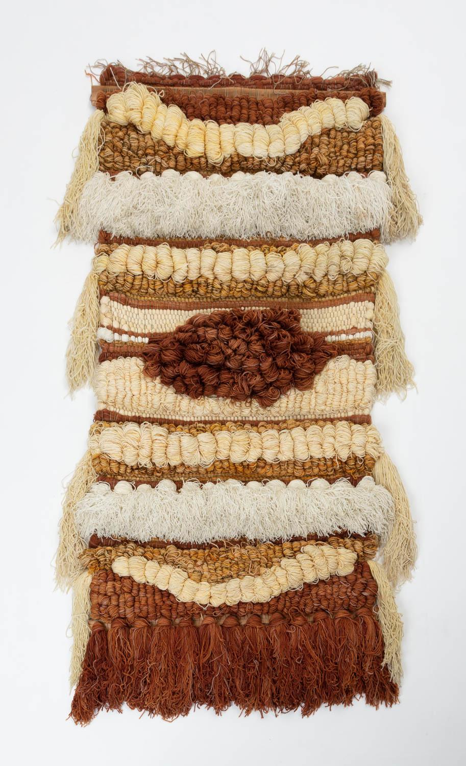 A large-scale wall hanging by Margo Farrin O’Connor for Ted Morris & Associates. Produced in California in the 1970s, this tapestry of handwoven and dyed fibers in brown, beige, brick red, and ivory colors is typical of O’Connor’s monumental