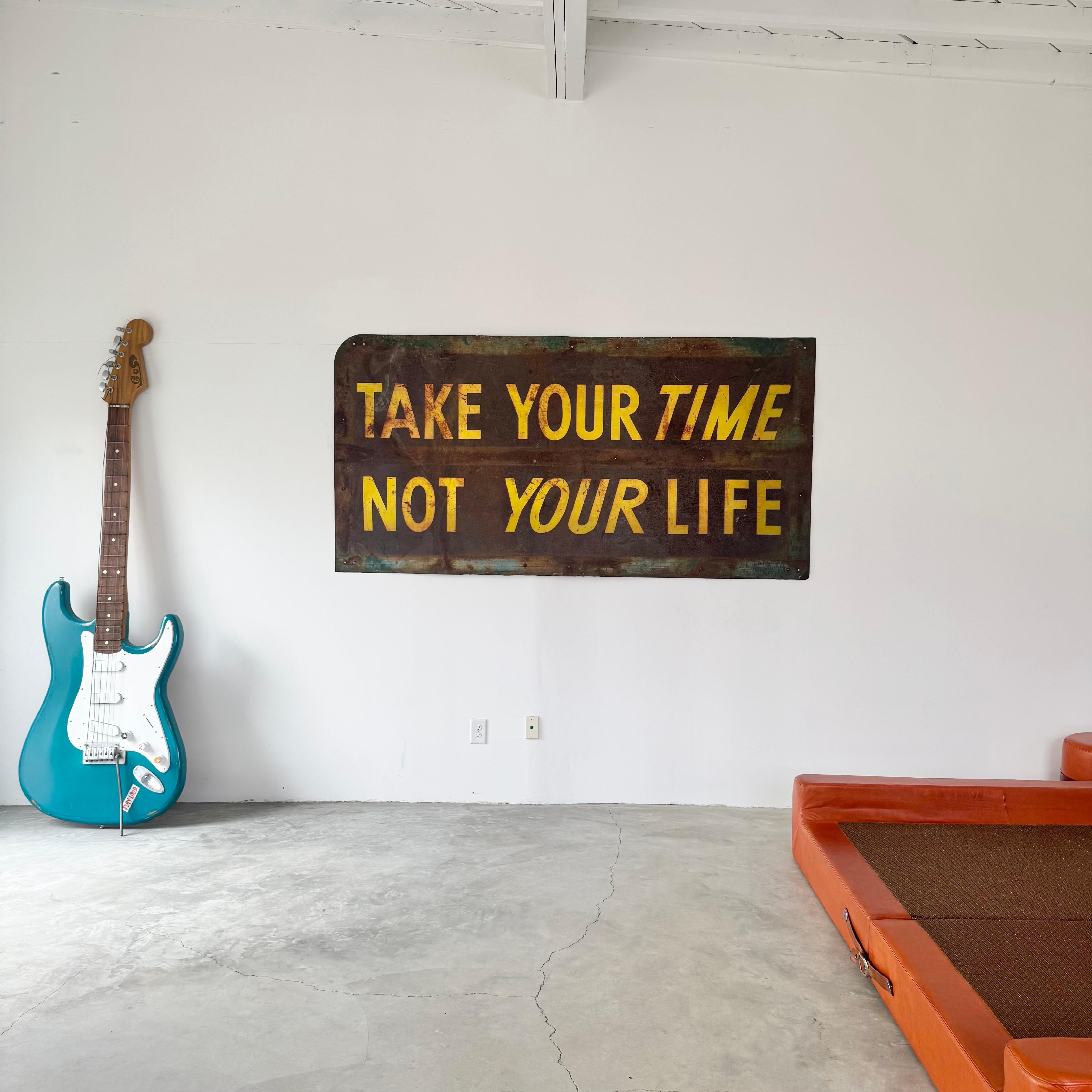 Massive California highway sign circa 1940s. Just over 8 feet long and 4 feet tall. Telling drivers to TAKE YOUR TIME , NOT YOUR LIFE. Extremely rare signs with no imagery anywhere online. These signs flanked both sides of a California highway