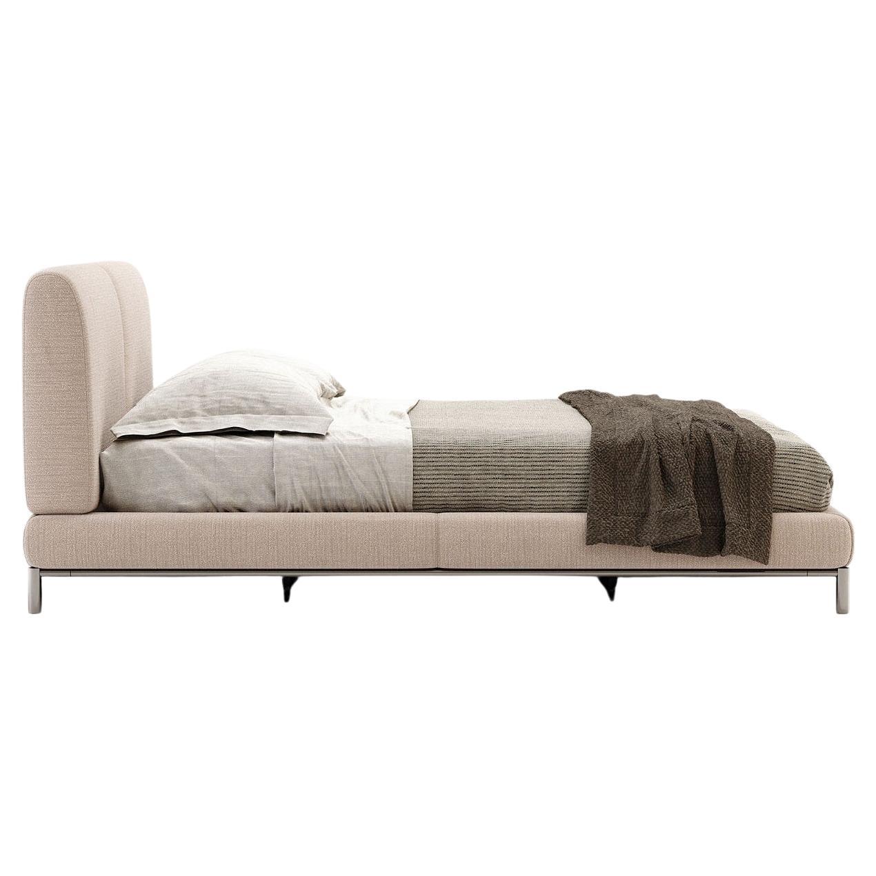 Crafted with a sophisticated silhouette and clean lines, this double bed becomes the focal point of your contemporary bedroom. This luxurious upholstered bed is generously proportioned for ultimate comfort, inviting you to sink into relaxation. This