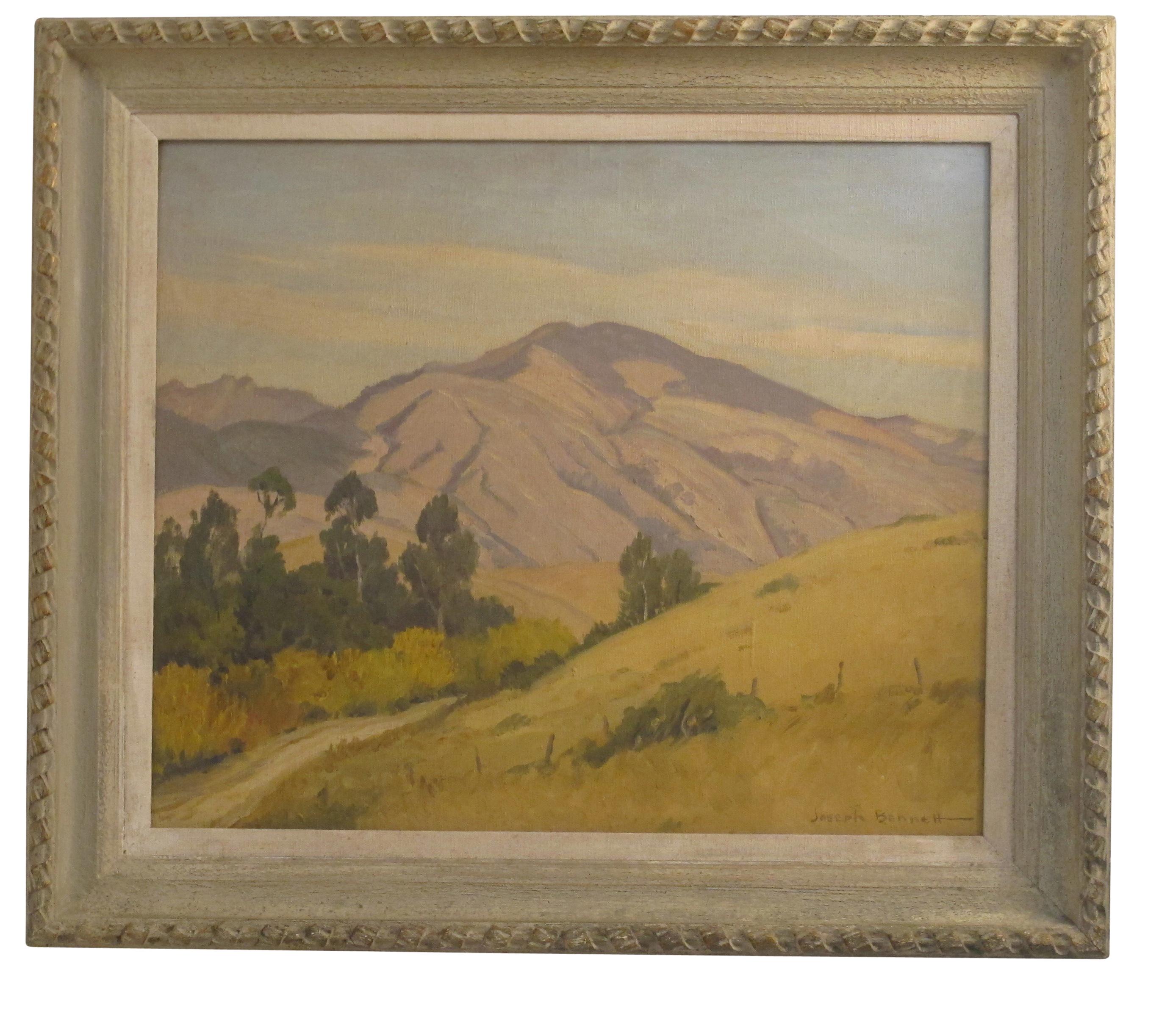 California landscape painting signed Joseph Bennett. Oil on canvas in carved and painted wood frame.
Joseph Hastings Bennett (b.1889 - d.1969) was a painter, etcher, and printmaker. He was born in San Diego, California on March 27, 1889. In his