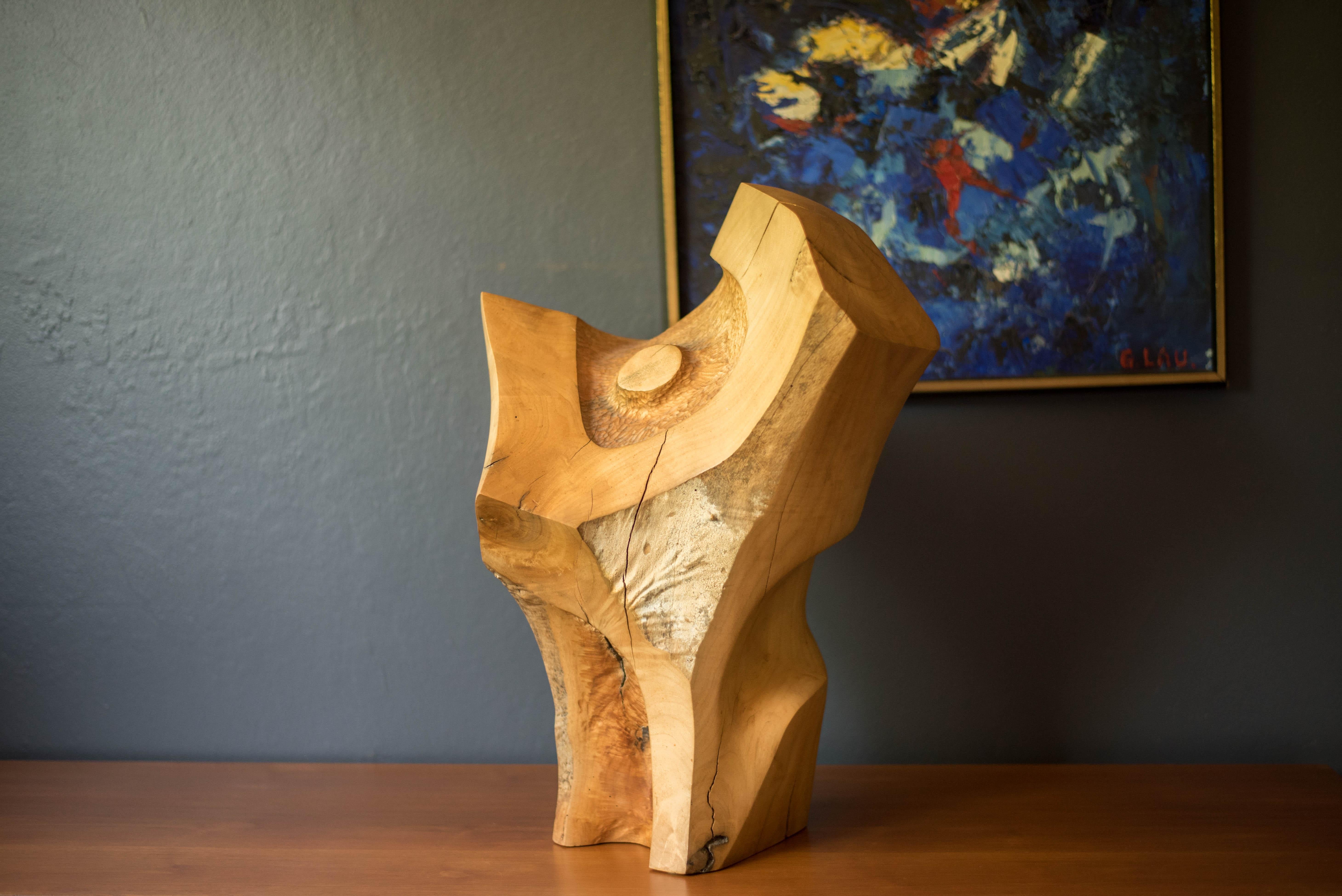 Mid century modern studio abstract sculpture designed by local woodworker Doug Ayers of Mendocino, California circa 1971. This solid piece has an organic free form shape perfect to display from any angle. Features unique hand crafted carvings and