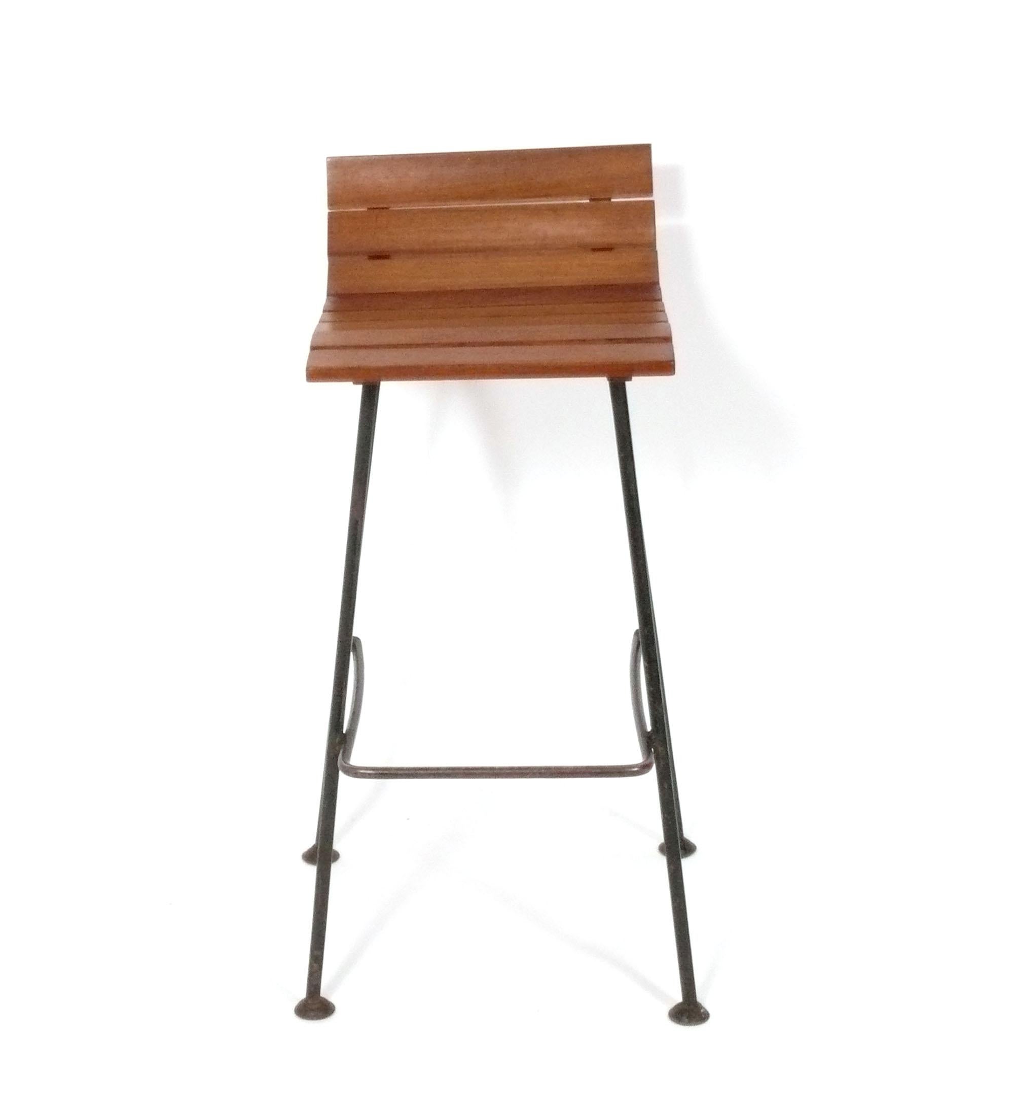 Set of Three California Modern Bar Stools, designed for Cal Vista, American, circa 1950s. They retain their warm original patina. They could be used as bar or counter stools and have a 28.5