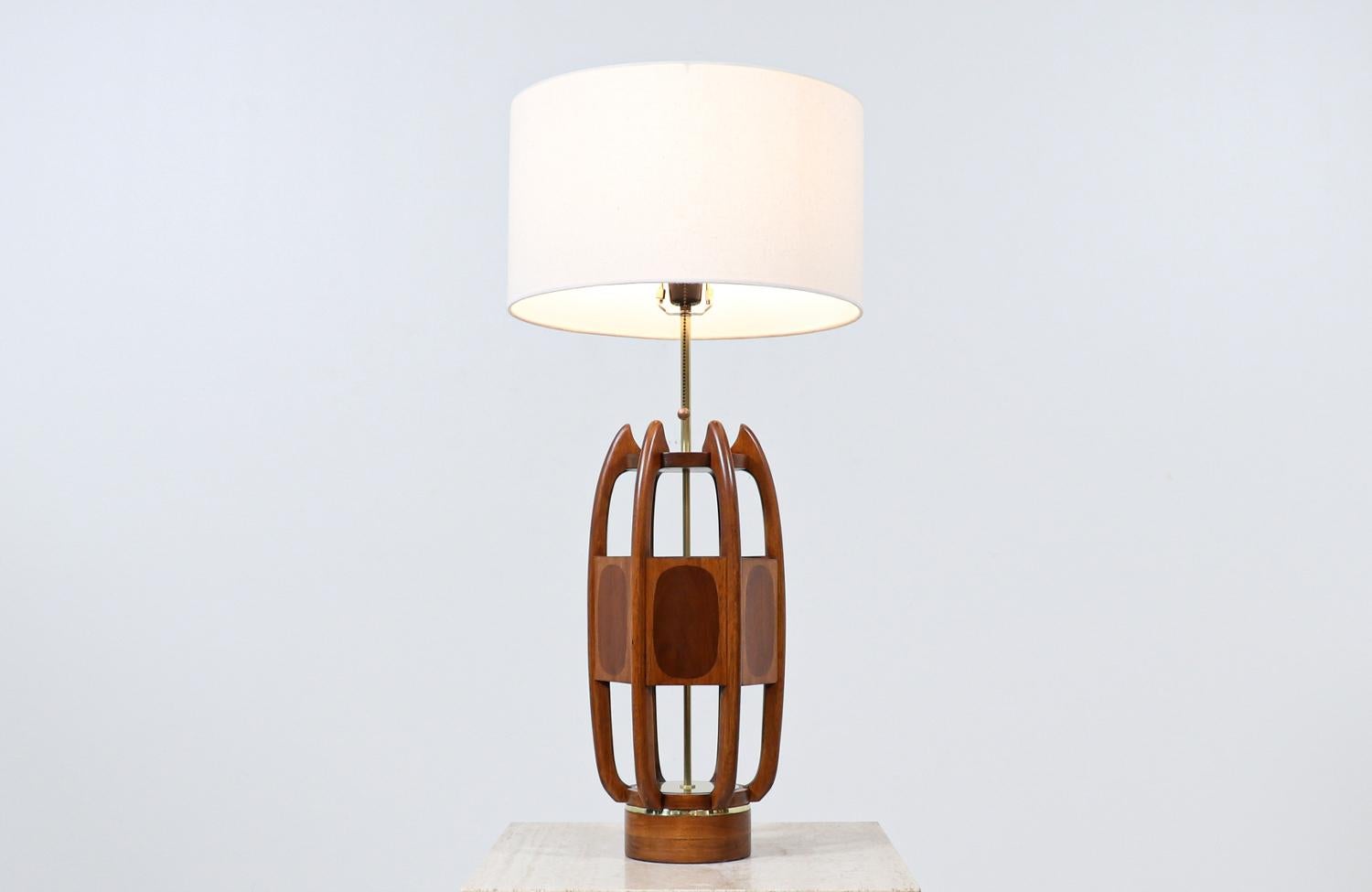 California modern sculpted table lamp with inlaid wood by Modeline of CA

Dimensions
36.50in H x 10in W x 10in D
Lamp shade:
10in H x 17in W x 17in D.
  