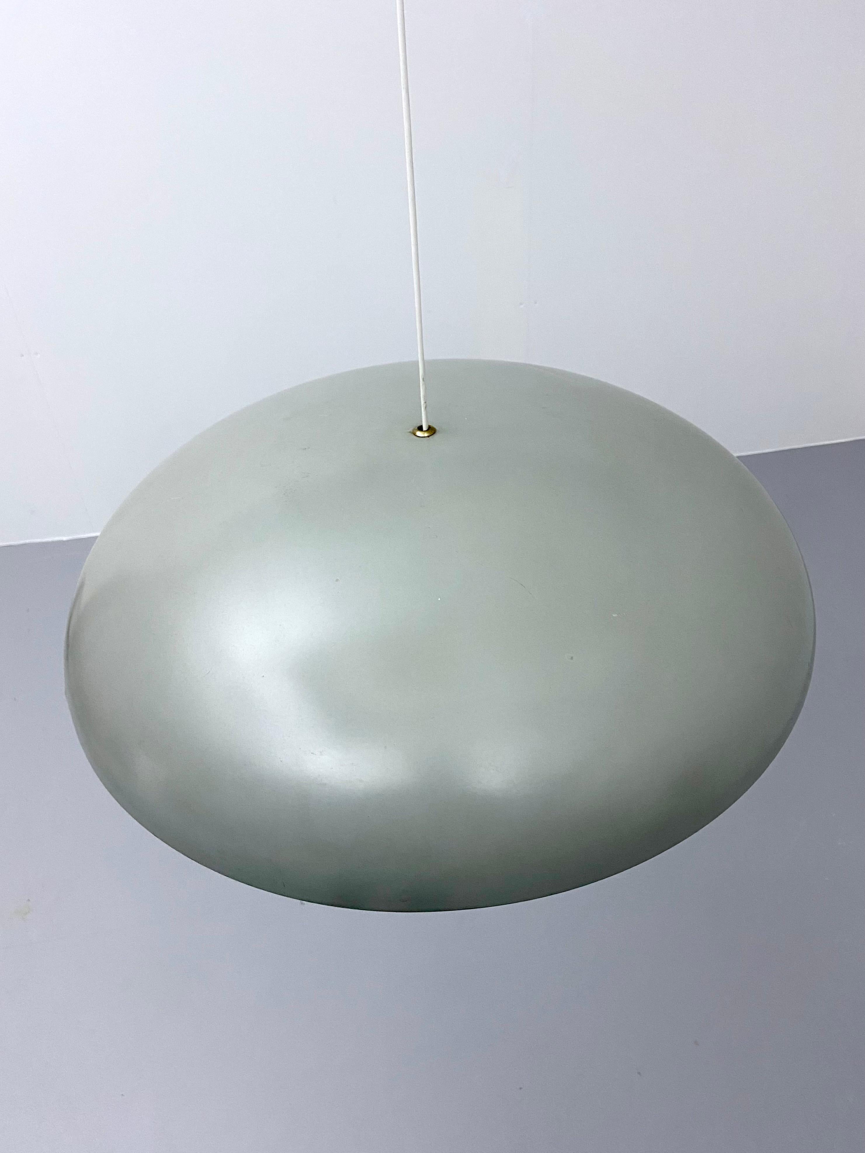 Designed in 1967 by Vilhelm Wohlert & Jørgen Bo for Louis Poulsen, this large pendant offers three interior sockets and a series of diffusing rings for a bright, warm glow. Its quite large with its 66 cm diameter and the paint is still original. The
