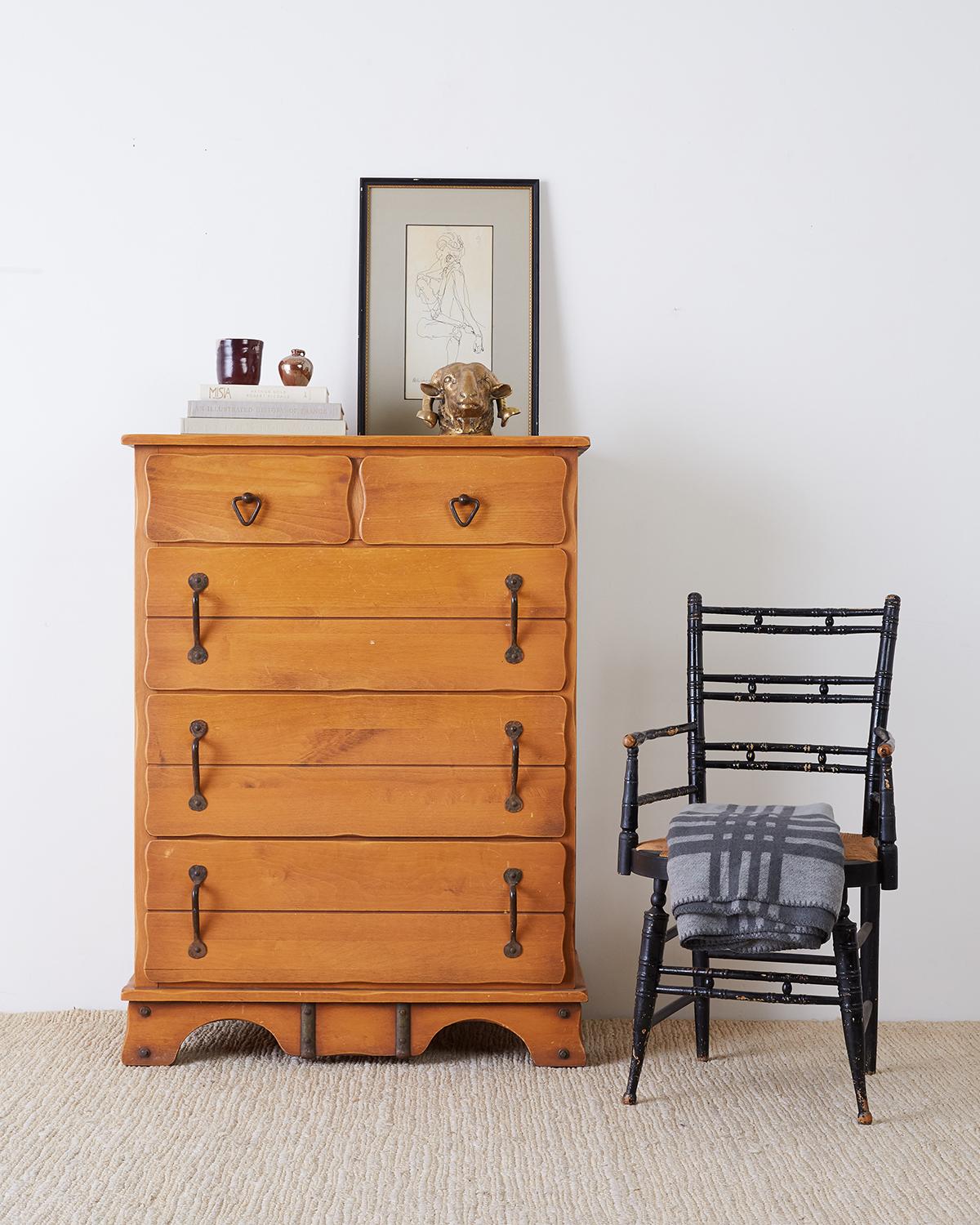 Classic Rancho Monterey chest of drawers or dresser by Frank Mason for Mason Furniture. California Mission style made of handcrafted alder and iron from Oregon. Five large storage drawers with hand-hammered iron pulls. Each drawer and top having