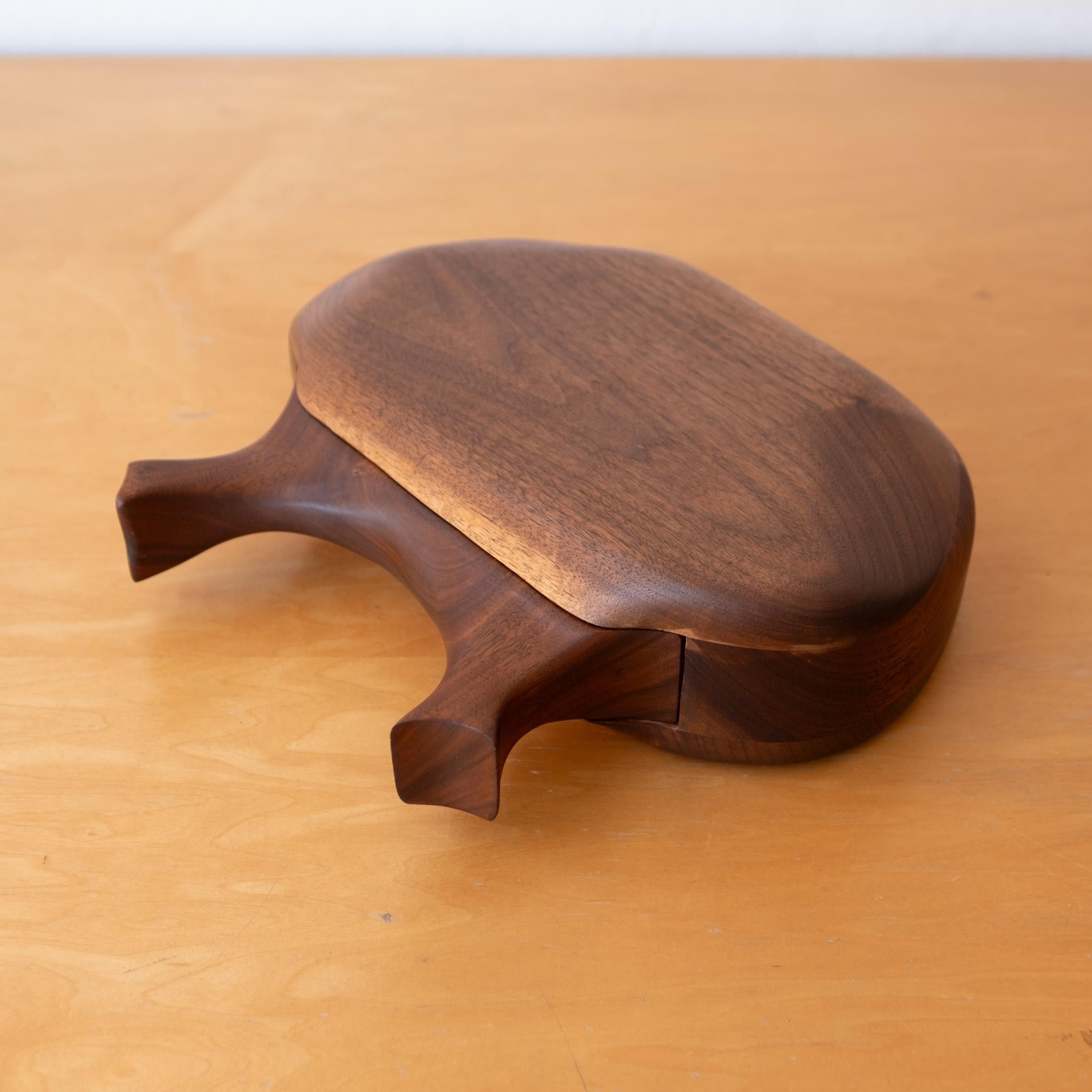 Handcrafted walnut jewelry or fetish box from the 1970s. Fur lined sliding drawer. Incredible craftsmanship. Unsigned
