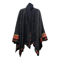 Callaghan Fall Winter 1990 by Romeo Gigli red roses Balck Cape