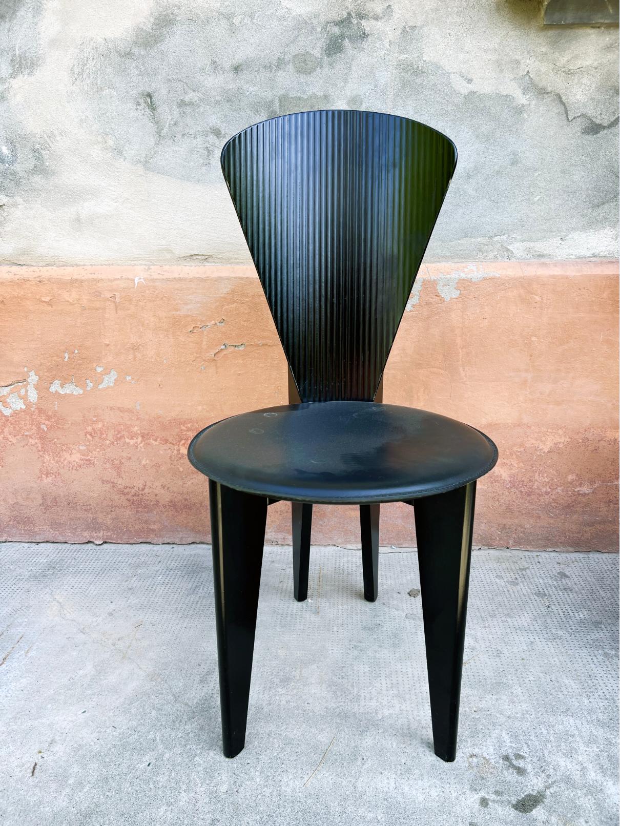 Circa 1980 - Calligaris Post Modern Chairs
Beautifully ribbed back , leather chairs, an example of post modern design.