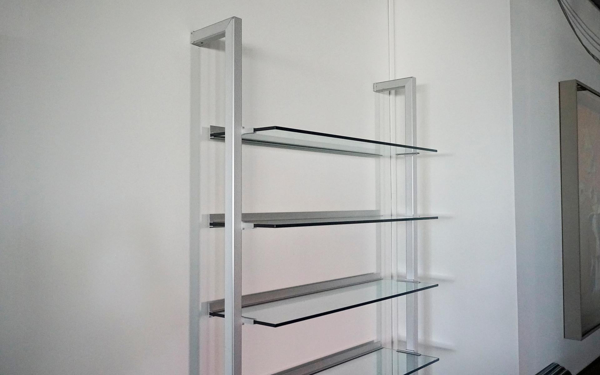 Italian Calligaris Wall Unit. Glass Shelves, Aluminum Frame, Wood Drawer. Signed. For Sale