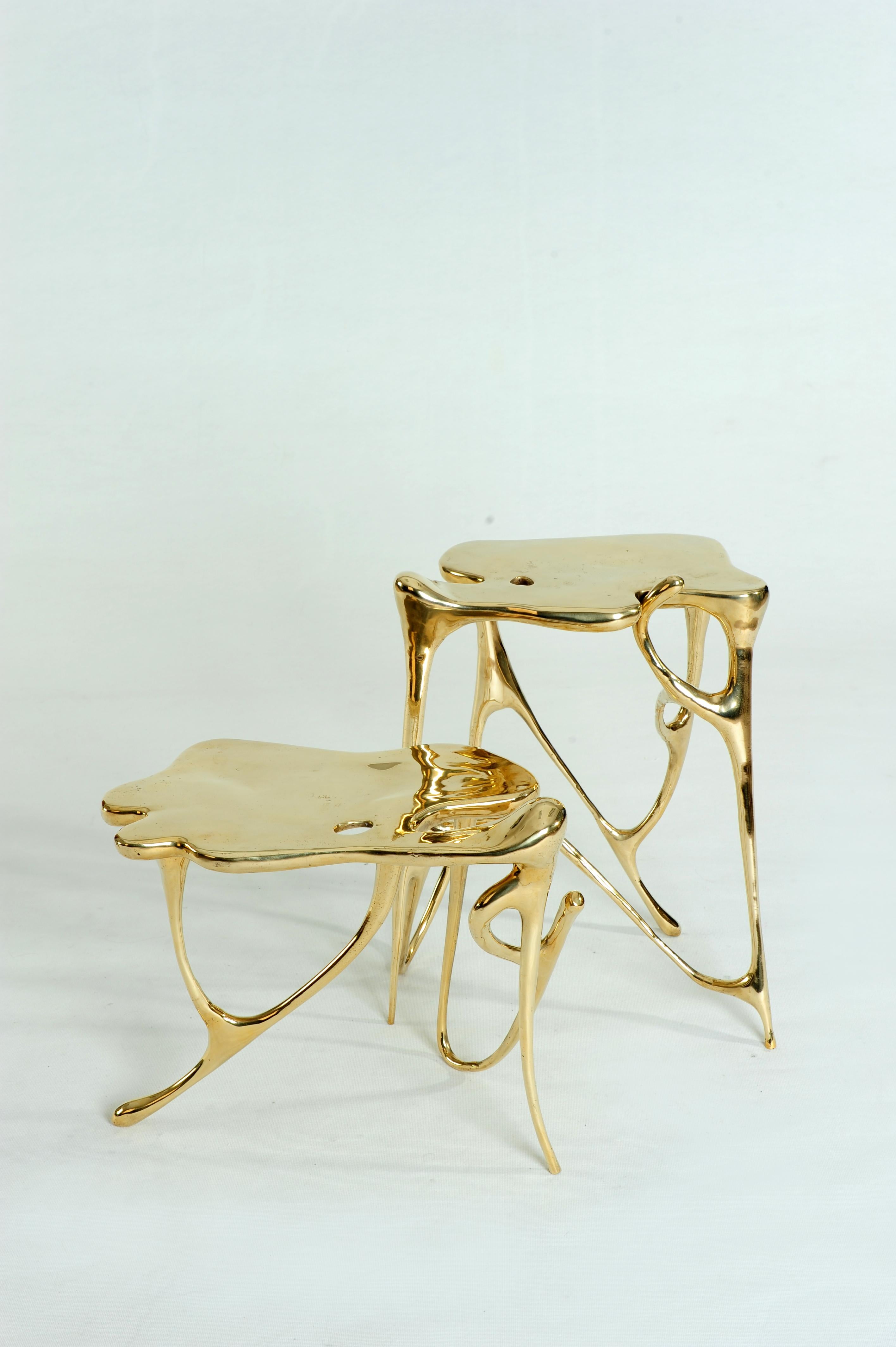 Calligraphic sculpted brass side table by Misaya
Dimensions: W 52 x L 31 x H 41 cm
Hand-sculpted brass table.

Misaya emulates Chinese ink paintings through the process of lost-wax casting.

Each piece in the Ink Collection – which consists of