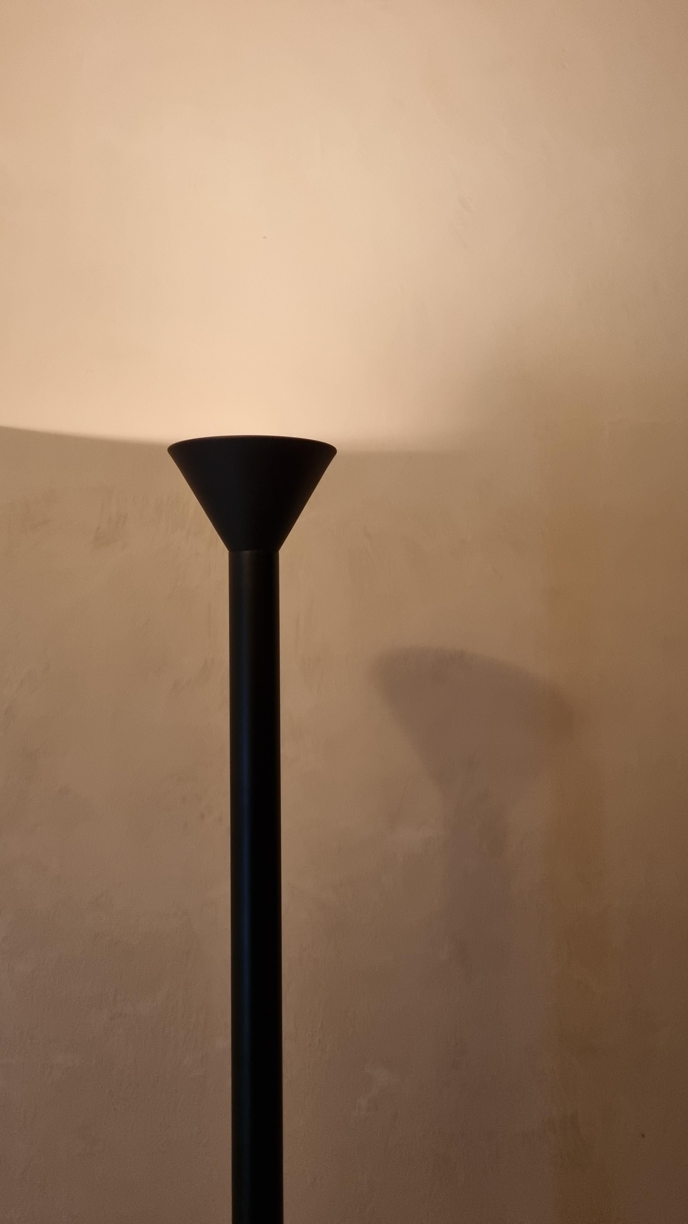 Callimaco floor lamp mod. designed by Ettore Sottsass in 1982 for Artemide.
Limited edition, black version, emblematic lamp of Sottsass Radical Design that brings artistic and conceptual research on everyday objects, transforming them into