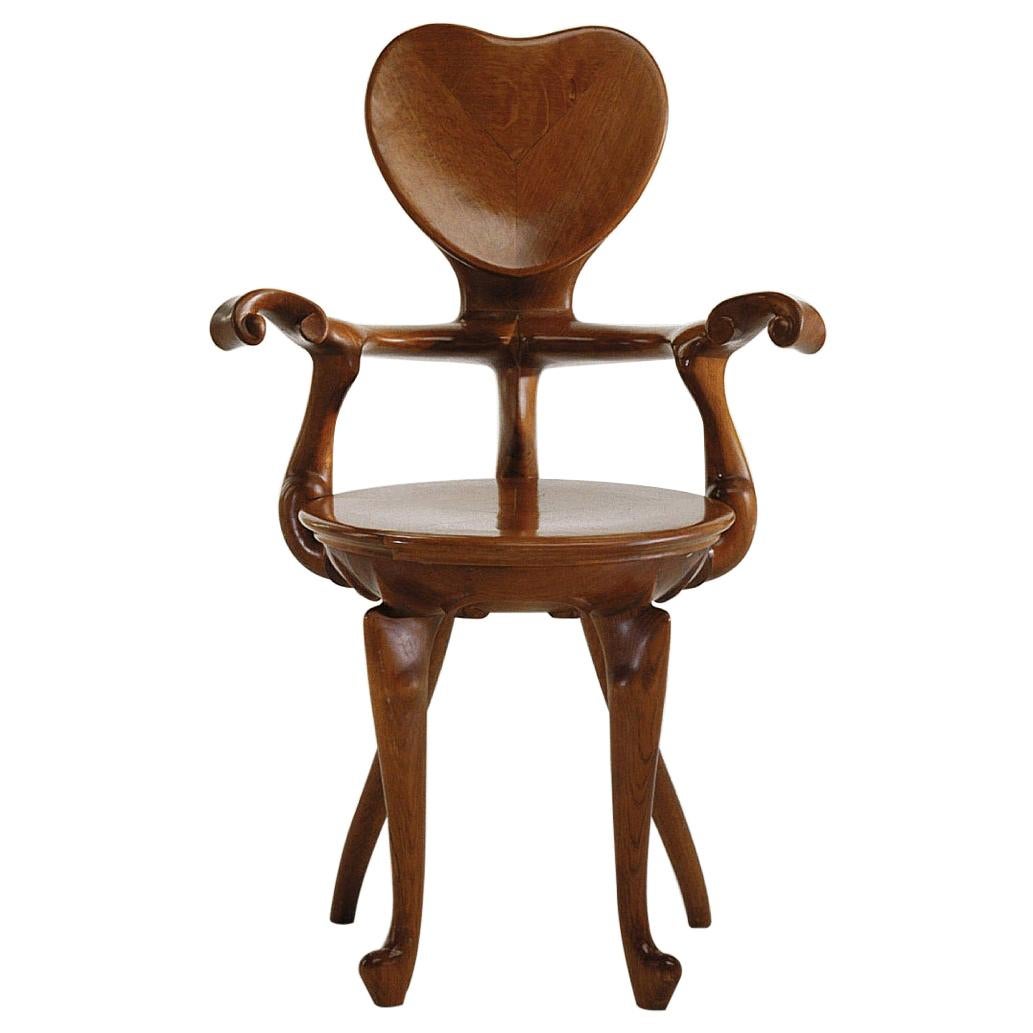 Calvet armchair in wood heart shape by Antoni Gaudi