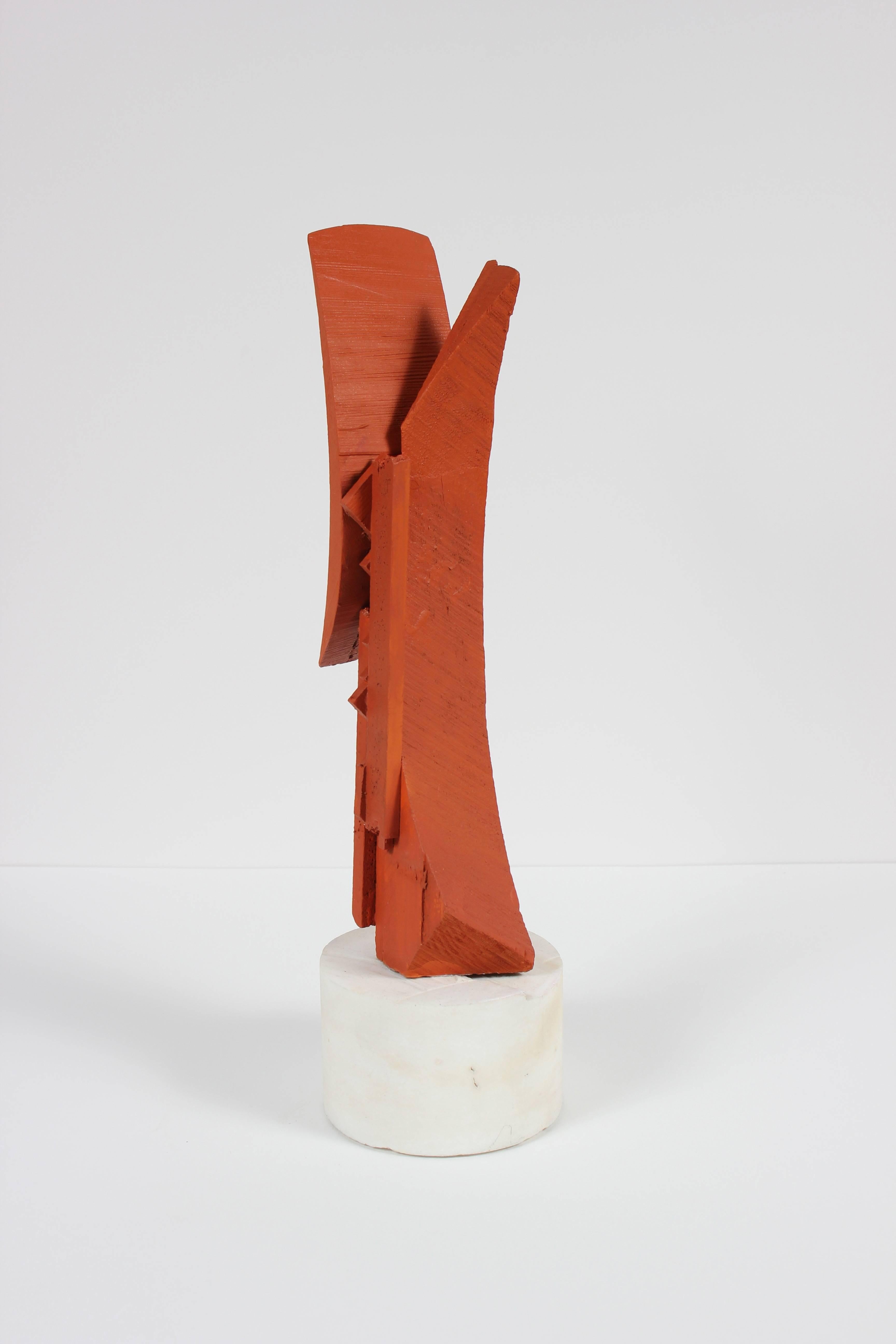 This mid 20th century painted wood sculpture affixed to a marble base is by Bay Area painter, printmaker, and designer Calvin Anderson (b. 1925).  He studied at CCAC and Art Center College in the 1940s and worked as a commercial art director in San