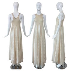 CALVIN KLEIN 2006 Vintage Bata semientallada de punto de cable de seda marfil y crema