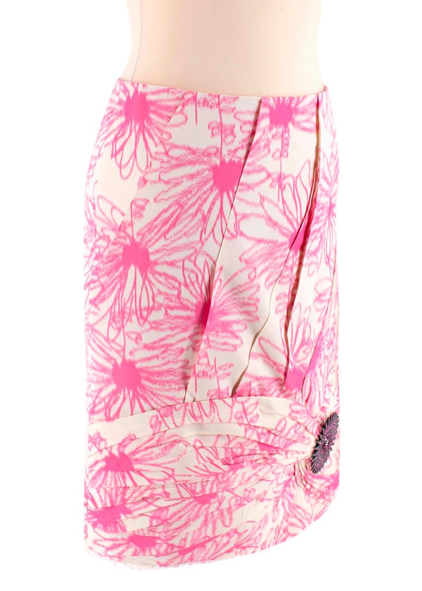 Calvin Klein 205W39NYC Brooch-Embellished Silk Skirt

- Retro cocktail silhouette
- Gathered panels
- Detachable pink crystal-encrusted gunmetal flower brooch
- Raw hem
- Hidden back zip
- Back slit
- Fully lined
- Pink and ivory floral