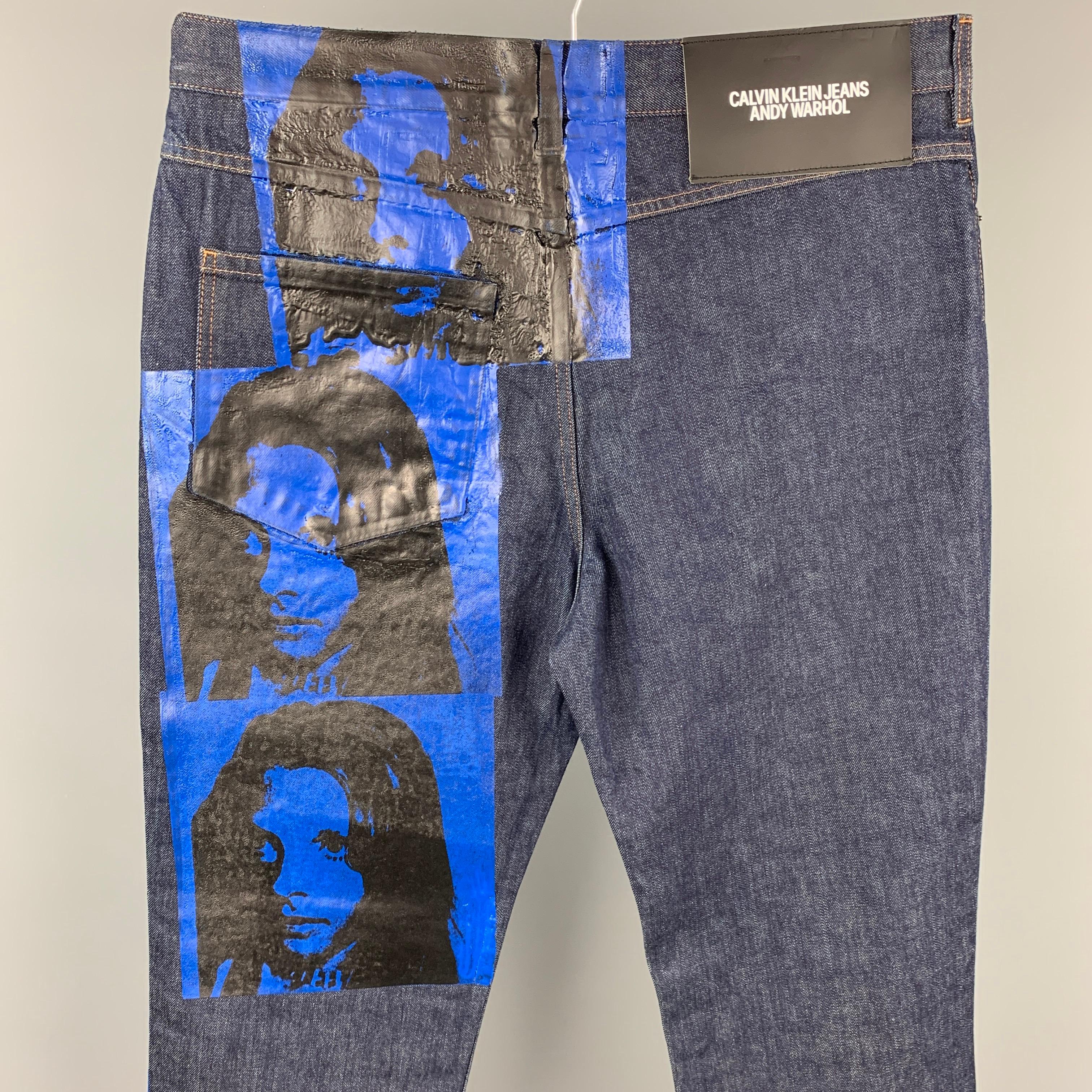 CALVIN KLEIN 205W39NYC by RAF SIMONS x Andy Warhol jeans comes in a indigo denim with a 70's Sandra Brant painted design featuring a regular fit, contrast stitching, and a zip fly closure. Made in Italy.

Very Good Pre-Owned Condition.
Marked: