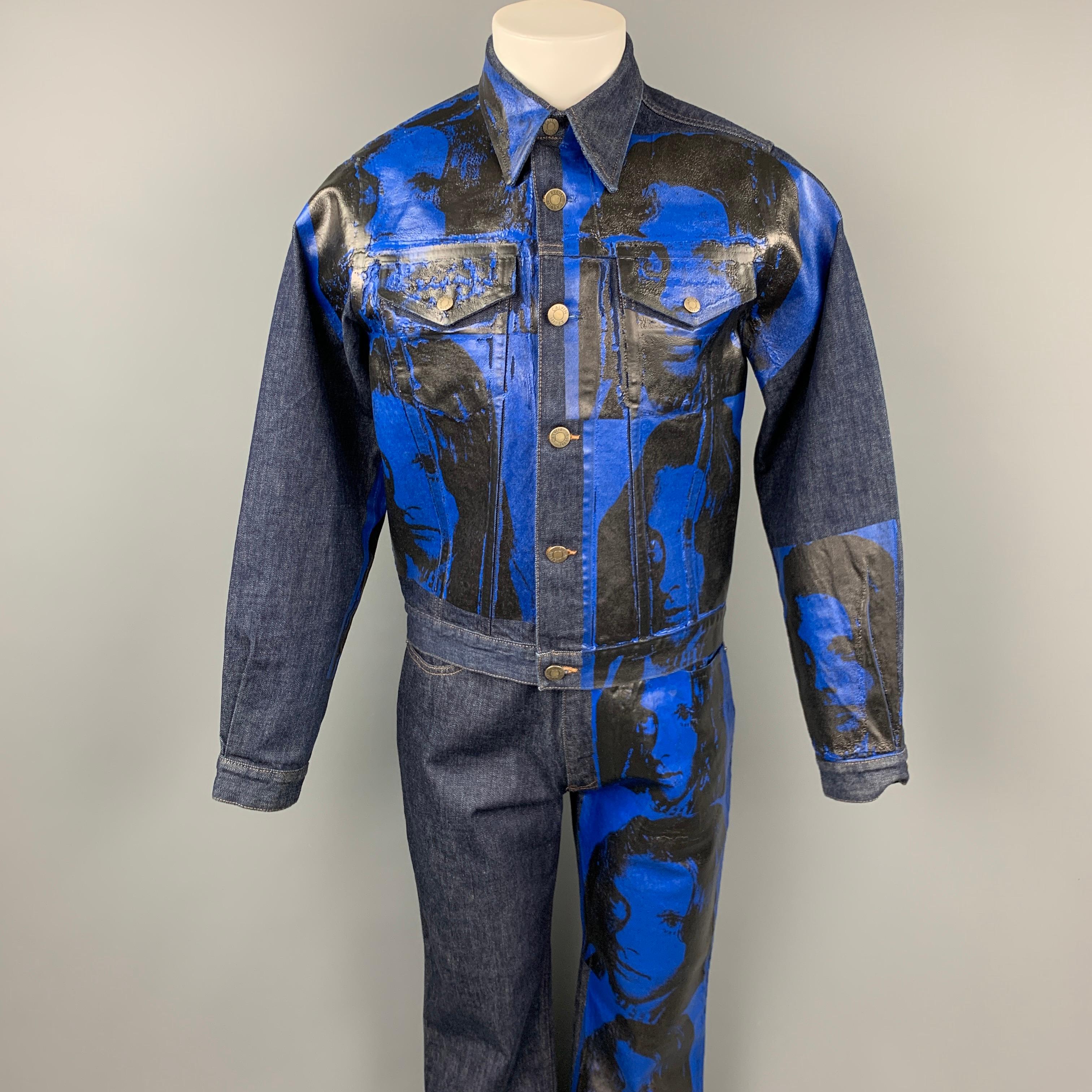 CALVIN KLEIN 205W39NYC by RAF SIMONS x Andy Warhol set comes in a indigo denim with a blue & black painted design of Sandra Brant in the 70's featuring contrast stitching, front pockets, tack buttons, and matching jeans. Made in Italy.

Very Good