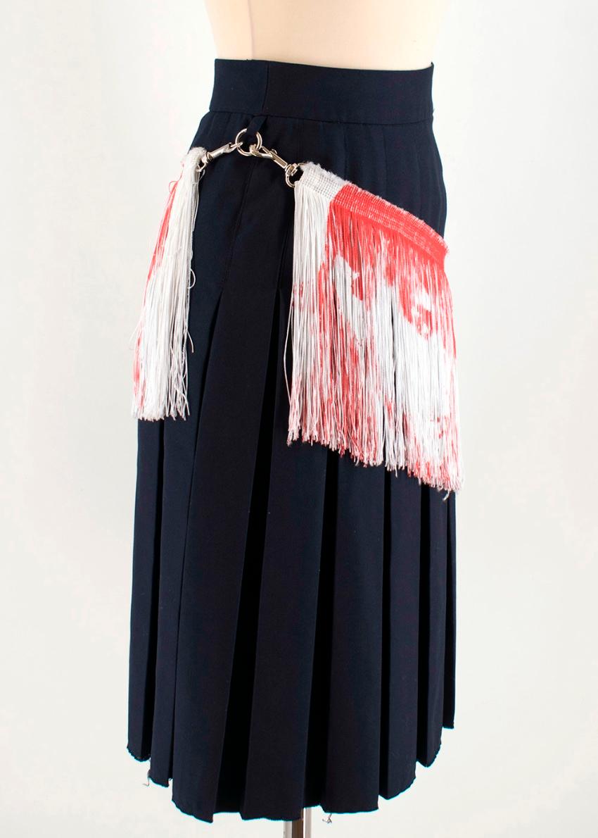 Calvin Klein X Andy Warhol Navy Skirt with Fringe detailing 

- Removable Fringe Design 
- Zip and clasp Back closure 
- Pleated Skirt 

65% Polyester 
35% Viscose 

Made in Italy 

Please note, these items are pre-owned and may show signs of being