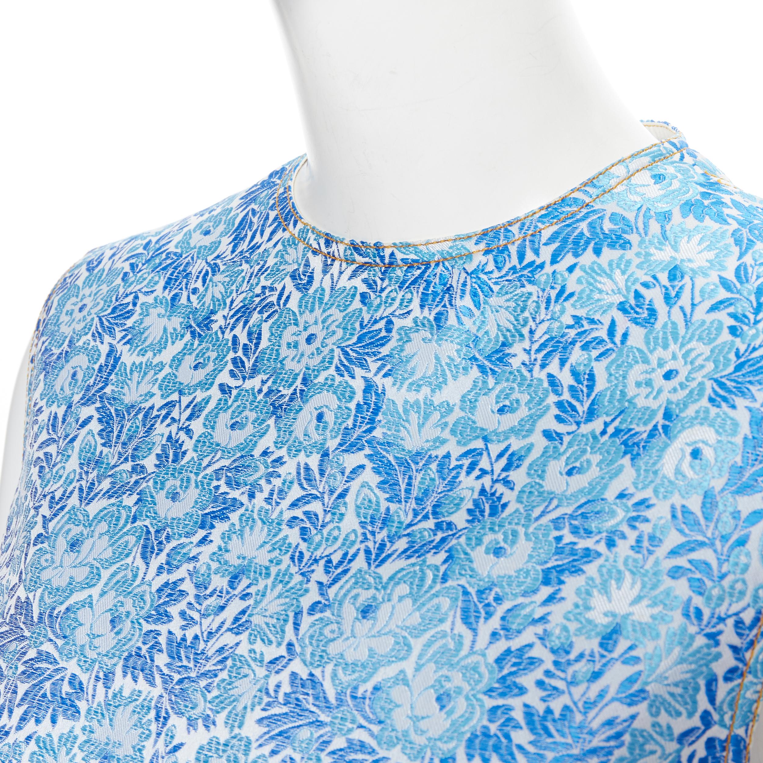 CALVIN KLEIN 205W39NYC RAF SIMONS blue floral jacquard sleeveless top Fr36 S 
Reference: LNKO/A01704 
Brand: Calvin Klein 
Designer: Raf Simons 
Material: Acetate 
Color: Blue 
Pattern: Floral 
Closure: Zip 
Extra Detail: Blue floral jacquard.