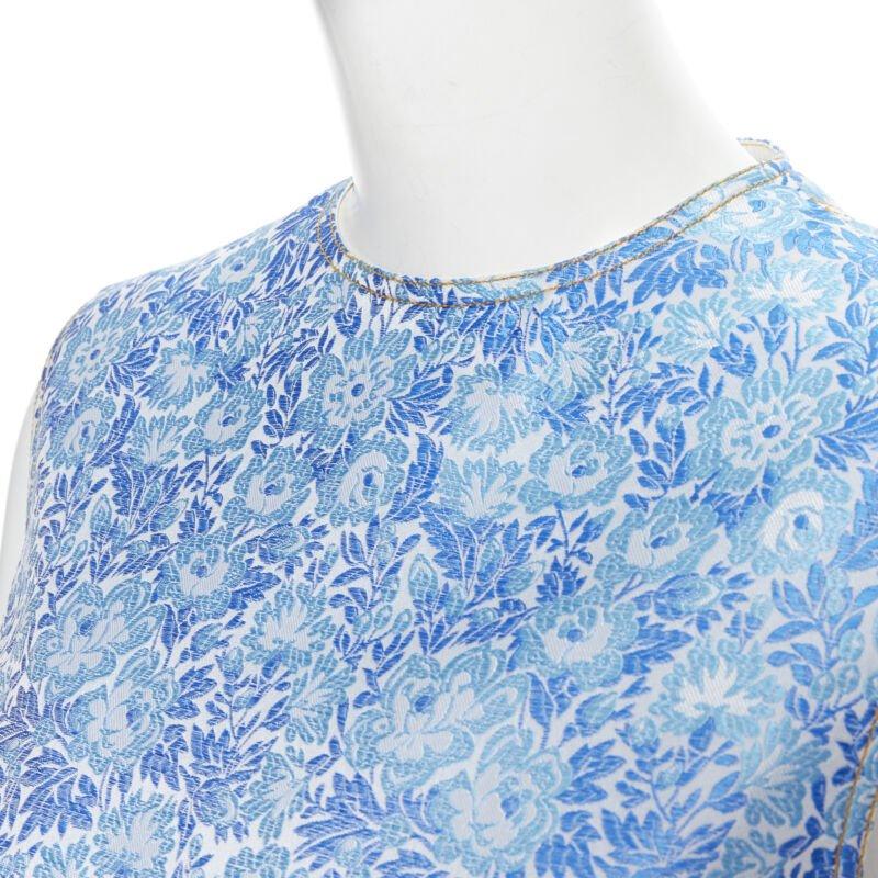 CALVIN KLEIN 205W39NYC RAF SIMONS blue floral jacquard sleeveless top Fr36 S
Reference: LNKO/A01704
Brand: Calvin Klein
Designer: Raf Simons
Material: Acetate
Color: Blue
Pattern: Floral
Closure: Zip
Extra Details: Blue floral jacquard.