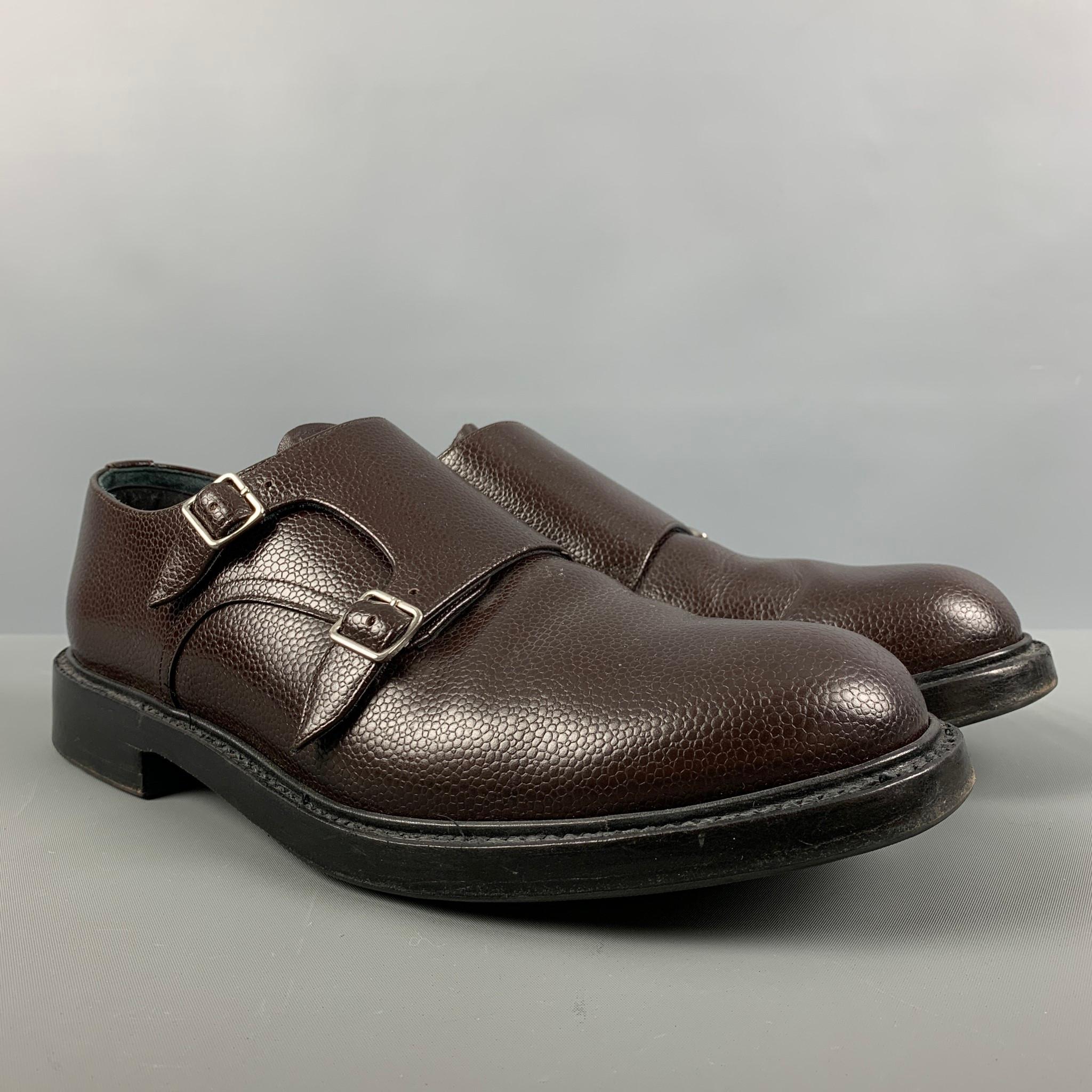 CALVIN KLEIN 205W39NYC loafers comes in a brown leather featuring a round toe, reptile texture, and a double monk strap. Made in Italy.

Excellent Pre-Owned Condition.
Marked: 43

Outsole: 12.75 in. x 4.5 in 

SKU: 124598
Category: Loafers

More