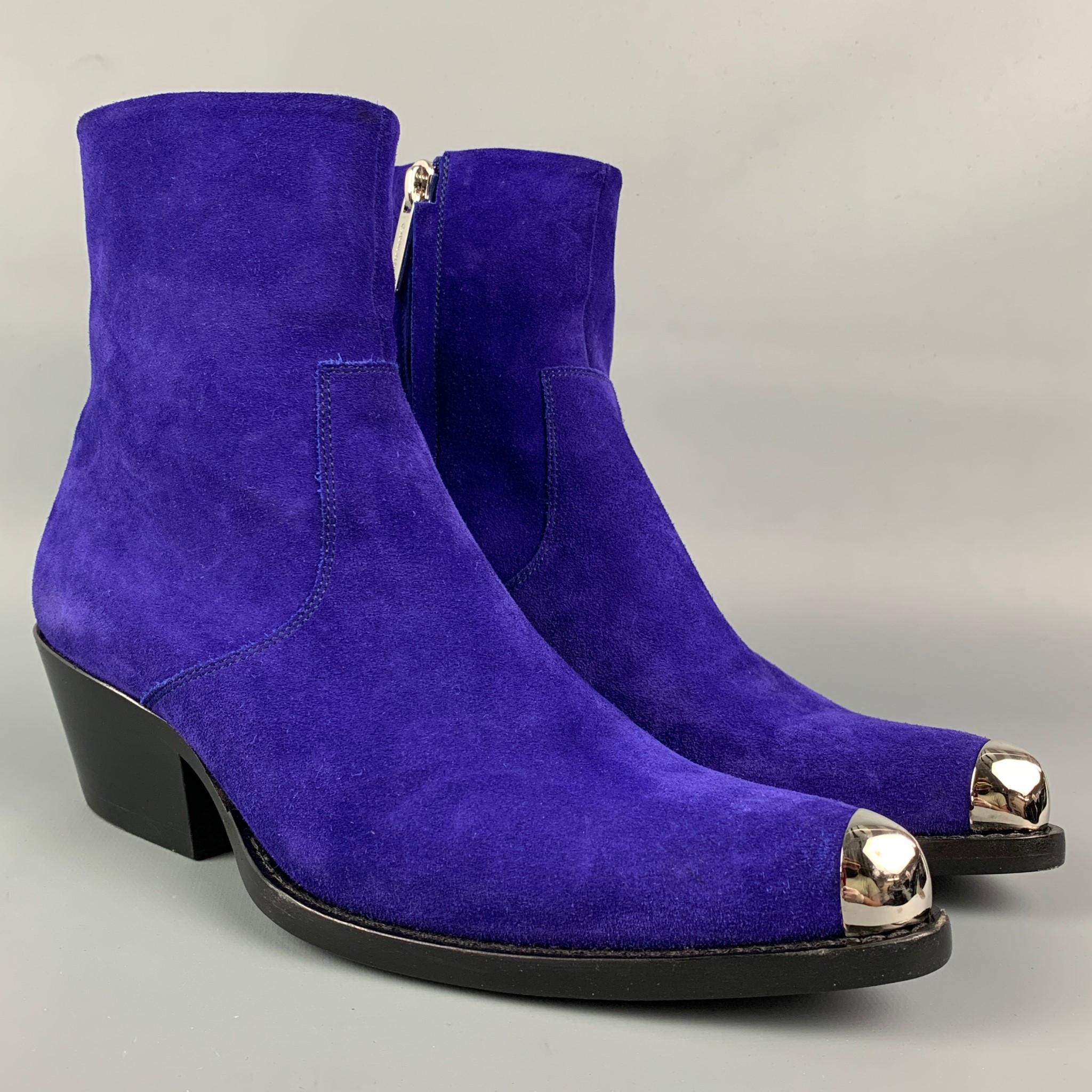 CALVIN KLEIN 205W39NYC ankle boots comes in a purple suede featuring a silver tone pointed toe, cuban heel, and a side zipper closure. Includes box. Made in Italy.

Very Good Pre-Owned Condition.
Marked: 36.5

Measurements:

Length: 10 in.
Width: